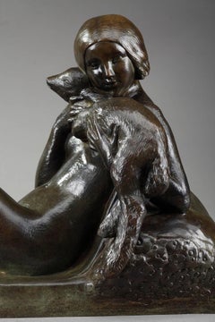 Sculpture en bronze d'une femme avec un agneau par Georges Coste