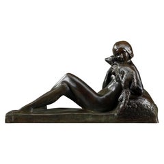 Sculpture en bronze d'une femme avec un agneau par Georges Coste