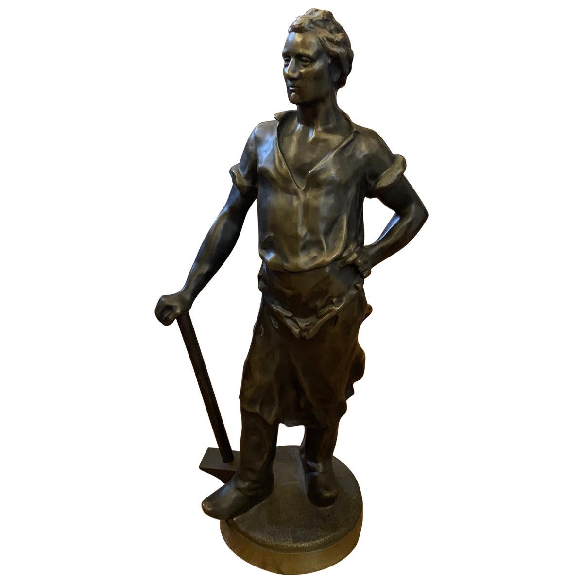 Bronze Sculpture of a Working Man holding a Sledgehammer