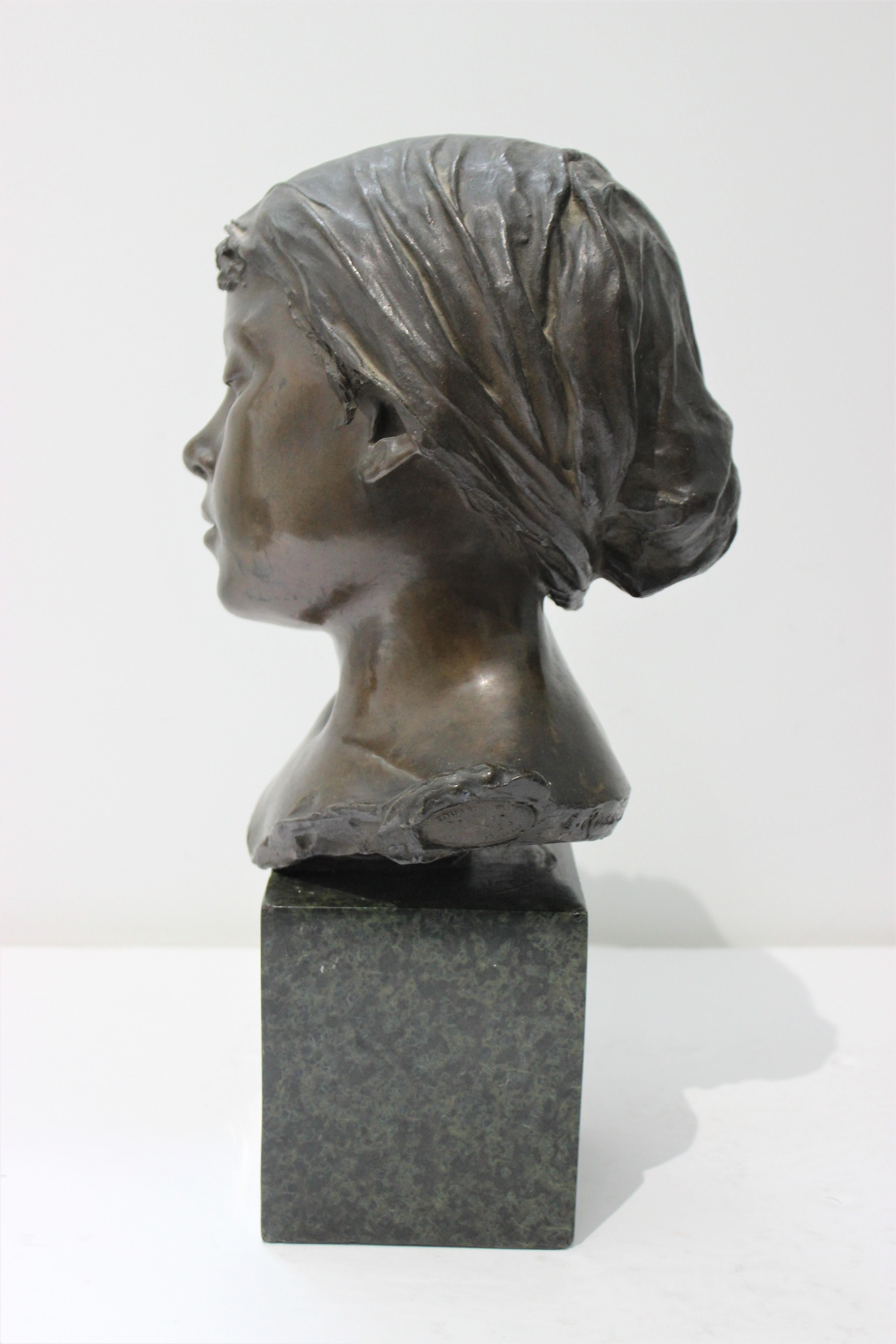 This stylish and romantic sculpture of a young Italian girl dates to the 1880s-1910s and was created by the sculptor Edouard Rossi of Naples.

Note: Dimensions of the marble base are 5.25
