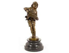 Sculpture en bronze représentant un jeune accordéoniste, de style Art déco