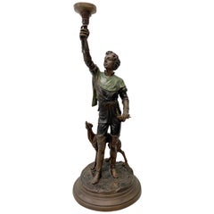 Sculpture en bronze d'un jeune homme avec un lévrier transformé en lampe de bureau