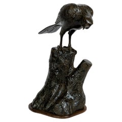 Bronze sculpture of an eagle on a tree stump, to be used as an incense burner