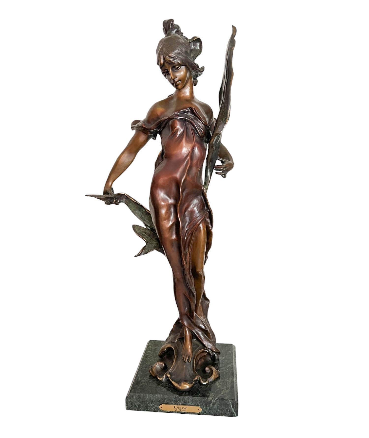 A bronze cast of Diana, Goddess of the Hunt, after Pierre Roche (French 1955 - 1922). The sculpture stands on a square green marble base.

Dimensions:

Base: 8