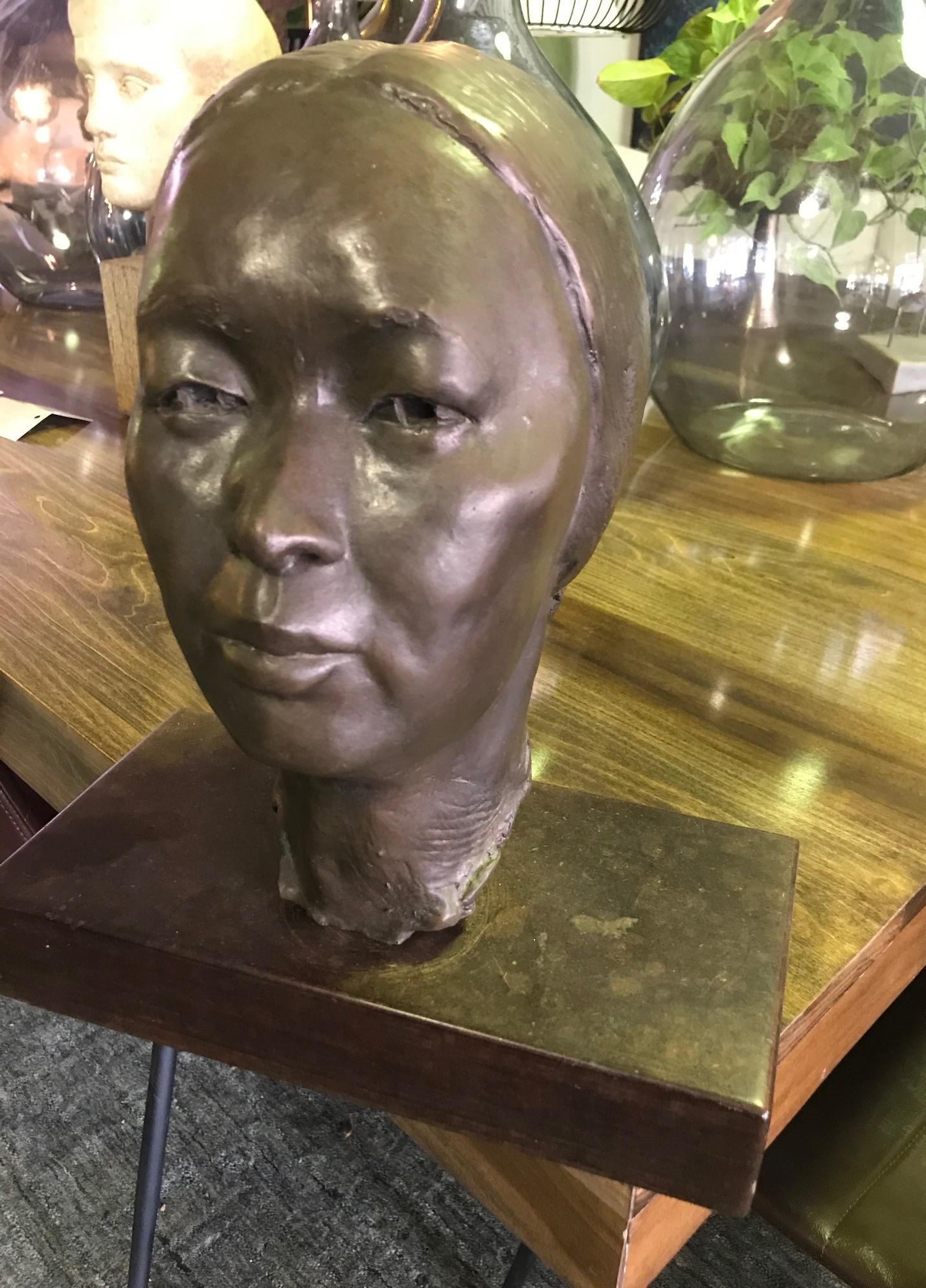 A wonderful, well-crafted work reminiscent of Isamu Noguchi's early work in bronze. 

Heavy and solid on a beautiful rosewood base.

Apparently unsigned. From a collection of Japanese antiques and prints.

Dimensions: 15