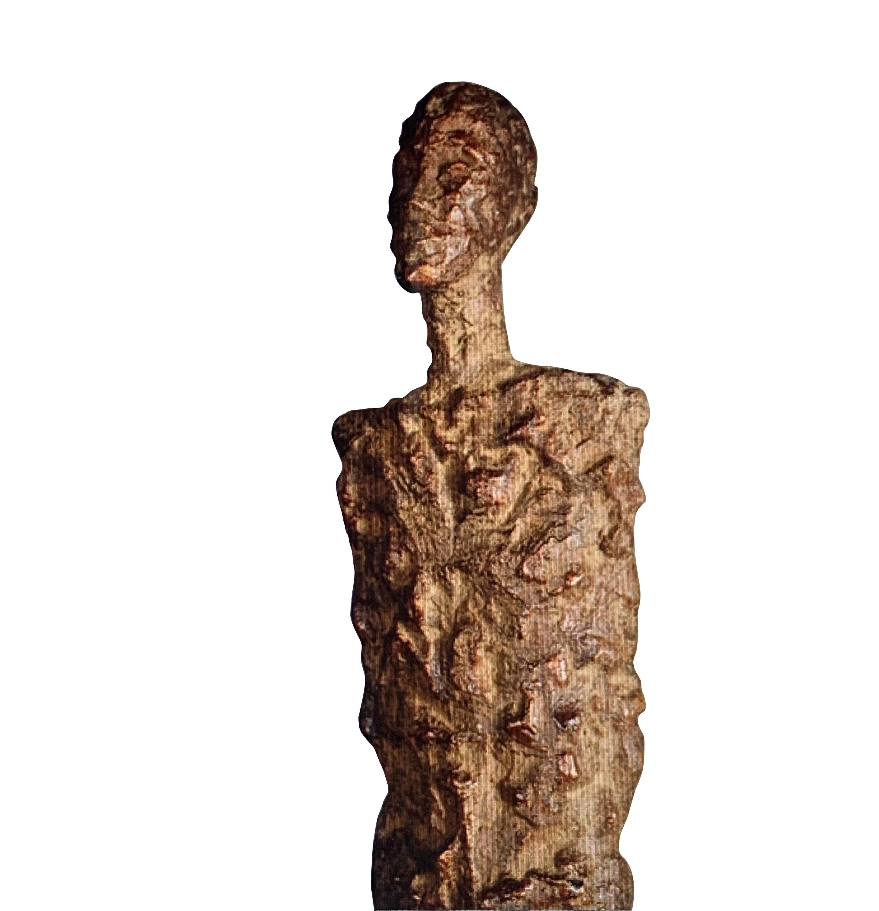 Indonesian textured bronze patina sculpture of a male figure.
She is sculpted in an elongated shape in the style of Giacometti.
The figure stands on a bronze base.
Stands on bronze base measuring 3