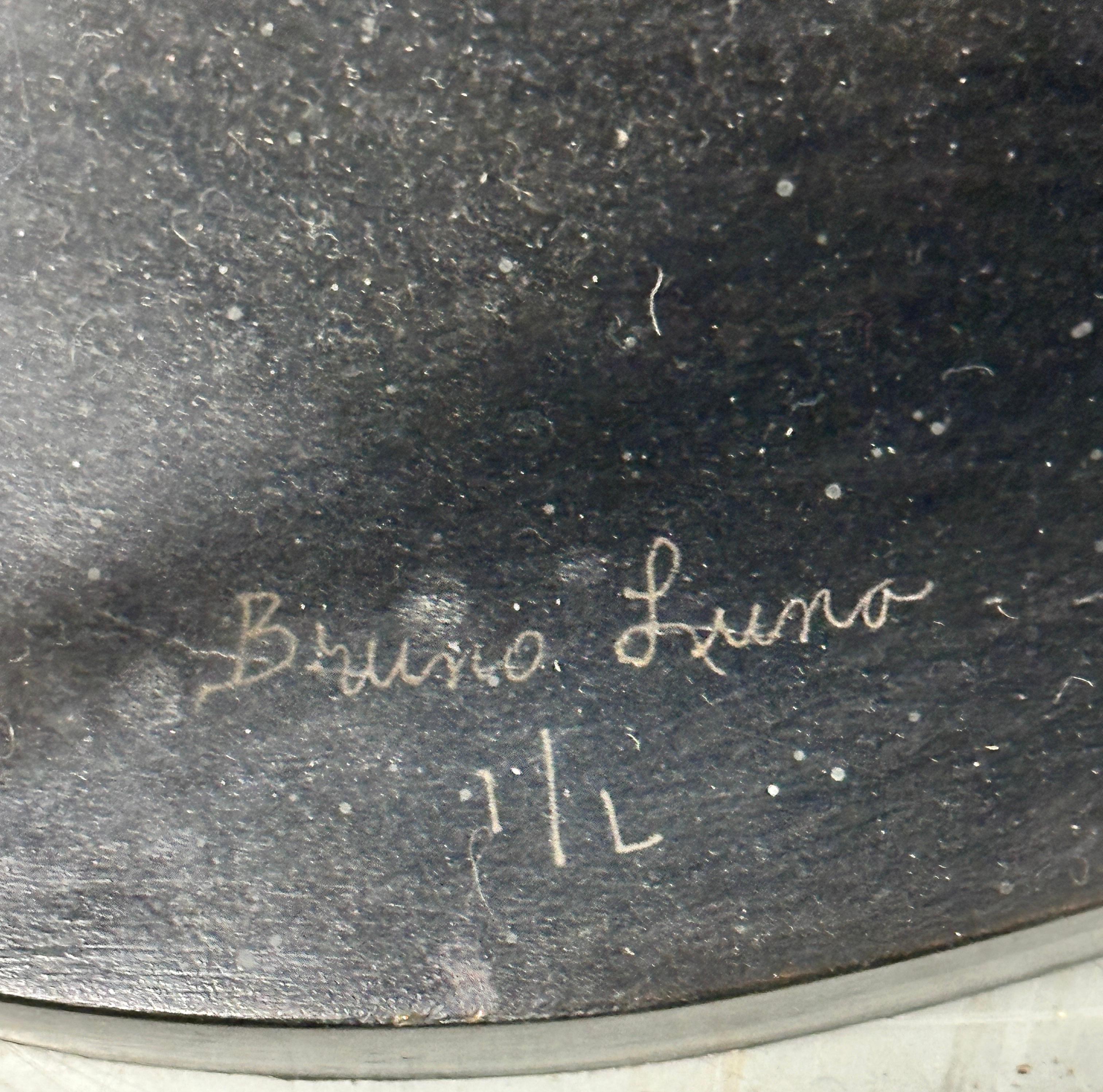 Scultura in bronzo di uomo con sigaro di Bruno Luna 