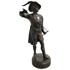 Bronze Sculpture of Musketeer Drawing a Weapon