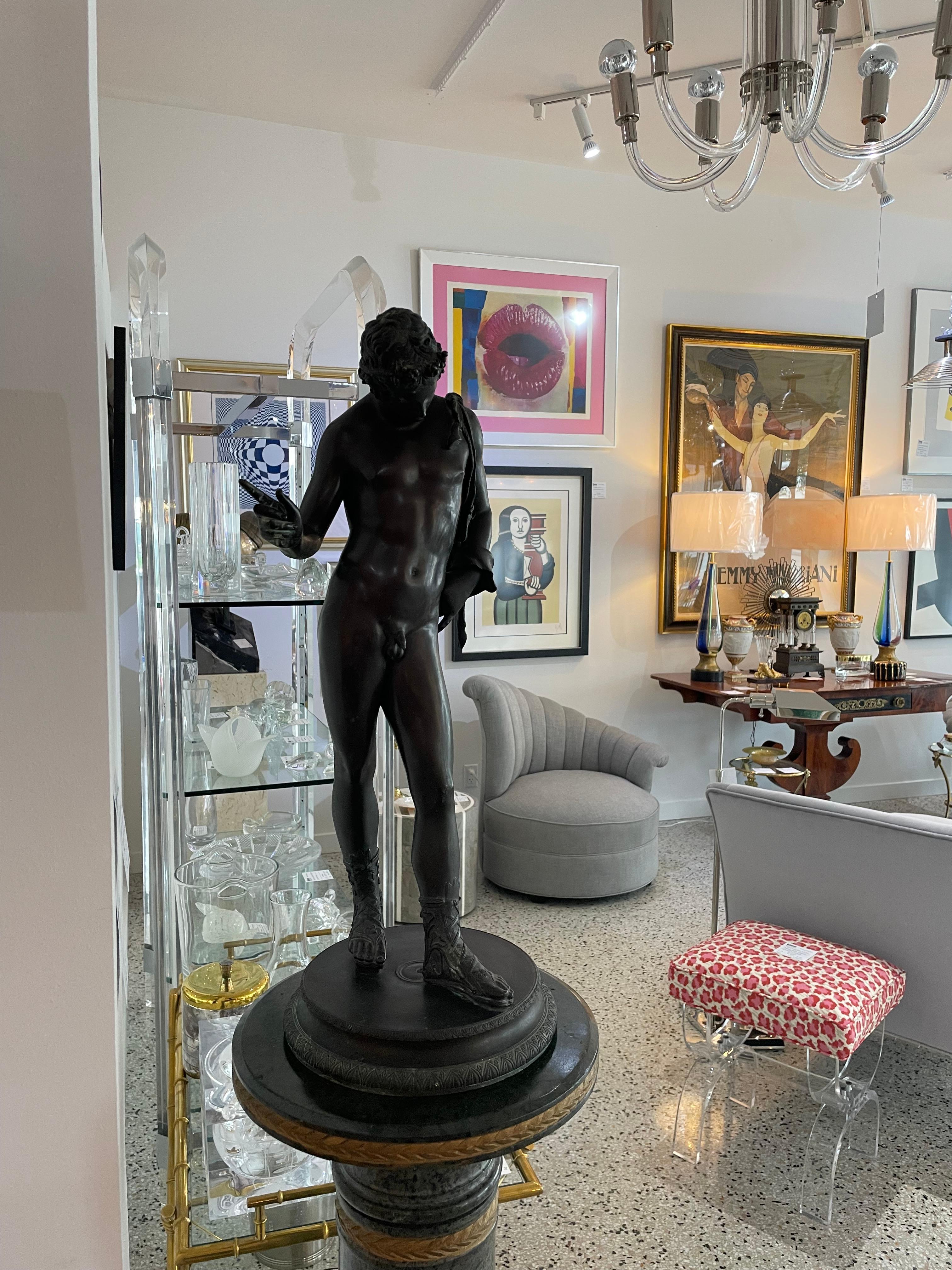 This large scale bronze sculpture of Narcissus dates to around 1890s and was created by the G Anodio foundry of Naples, Italy.

Note: Signed G Anodio Napoli on the top of the base (see images).

Note: Diameter of the base is 9.50