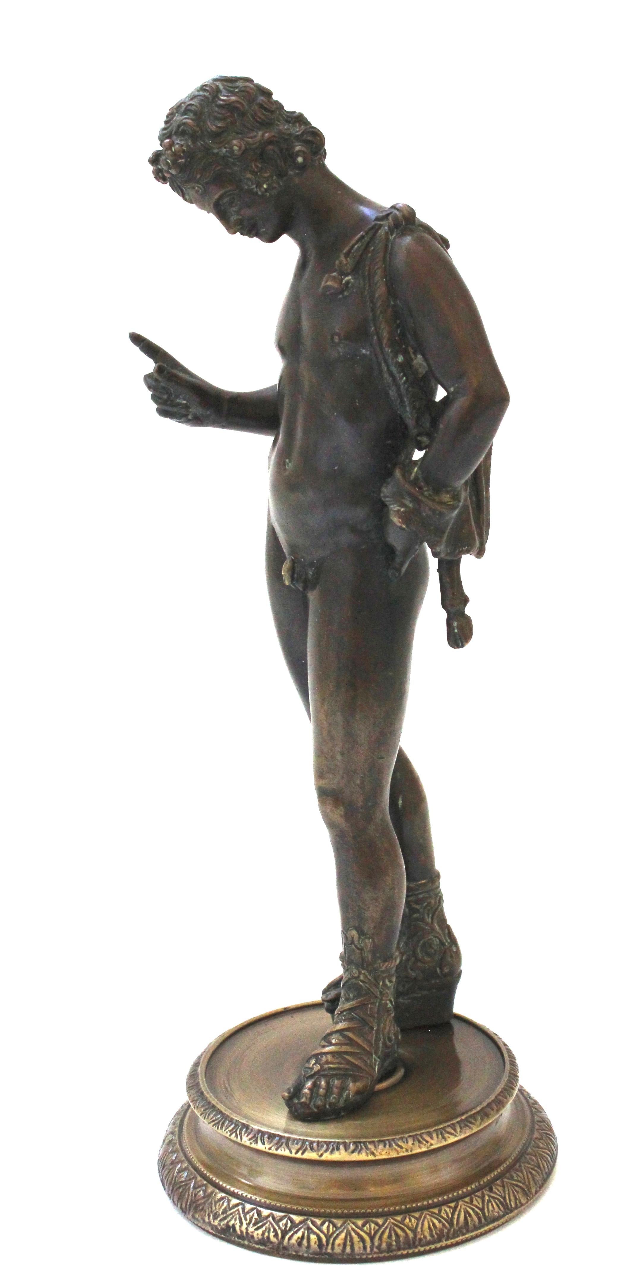 This stylish Italian grand tour bronze of Narcissus was acquired from an estate in Aurora, NY and it dates to the late 19th century. 

Note: Base diameter is 4