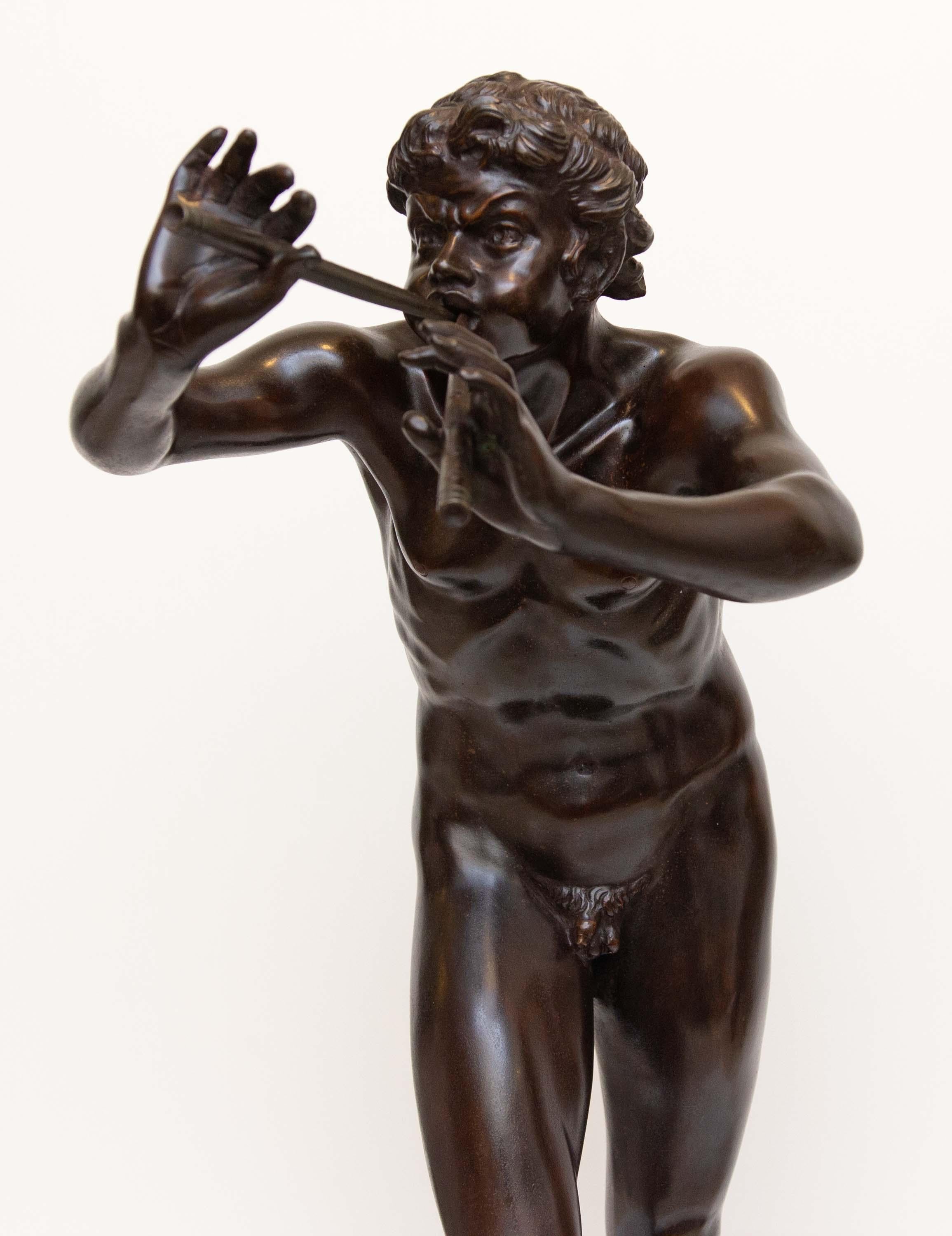 Early 20th century bronze statue of a nude Pan playing the flute. Signed F. De Luca. Grand Tour.