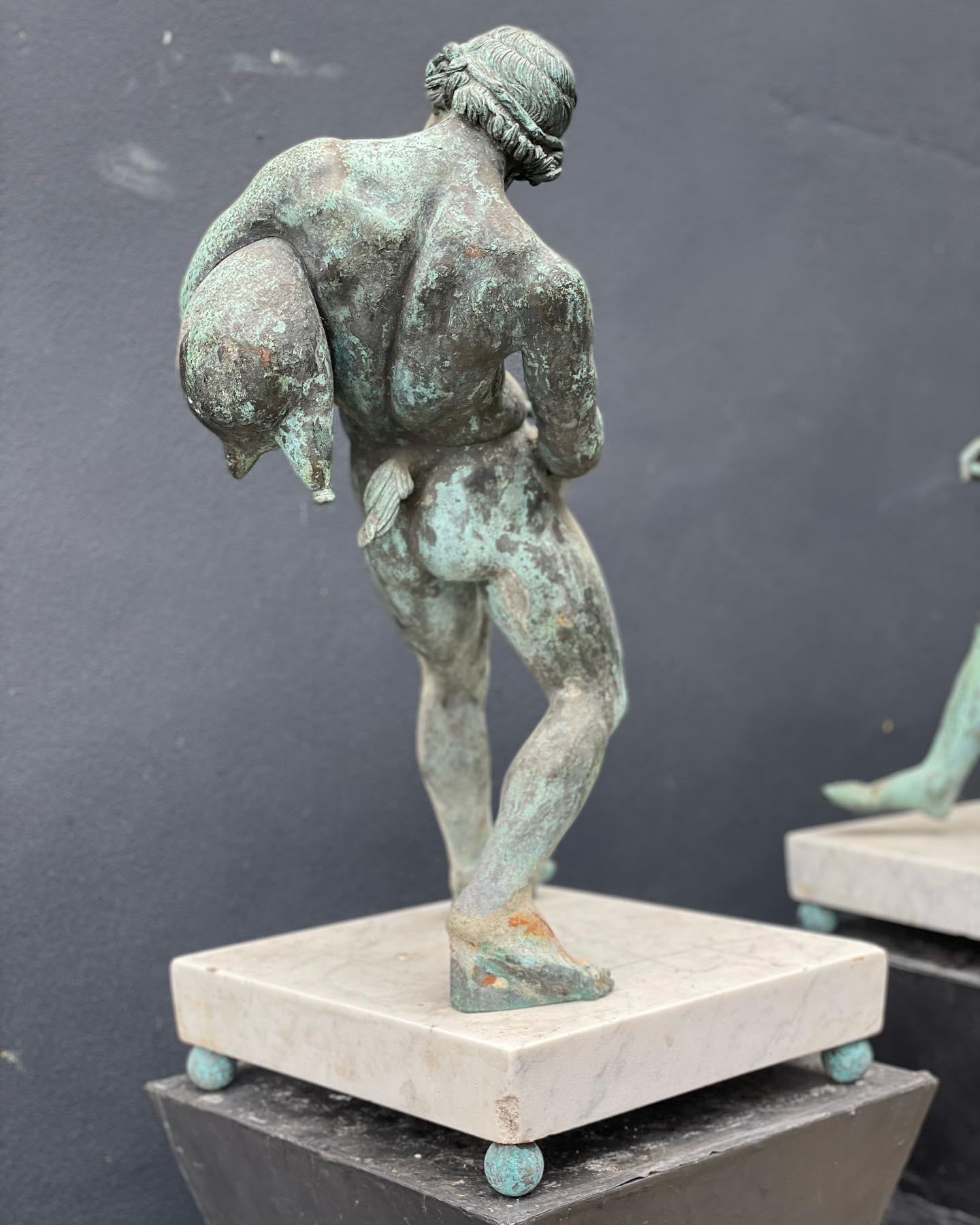Bronze sculpture of Satyr with Wineskin in step position sitting upon a heavy marble base.

marble base is 30cm Deep and 31cm Wide.

 