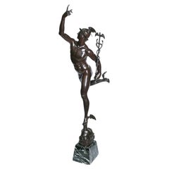 Escultura de bronce del dios Mercurio