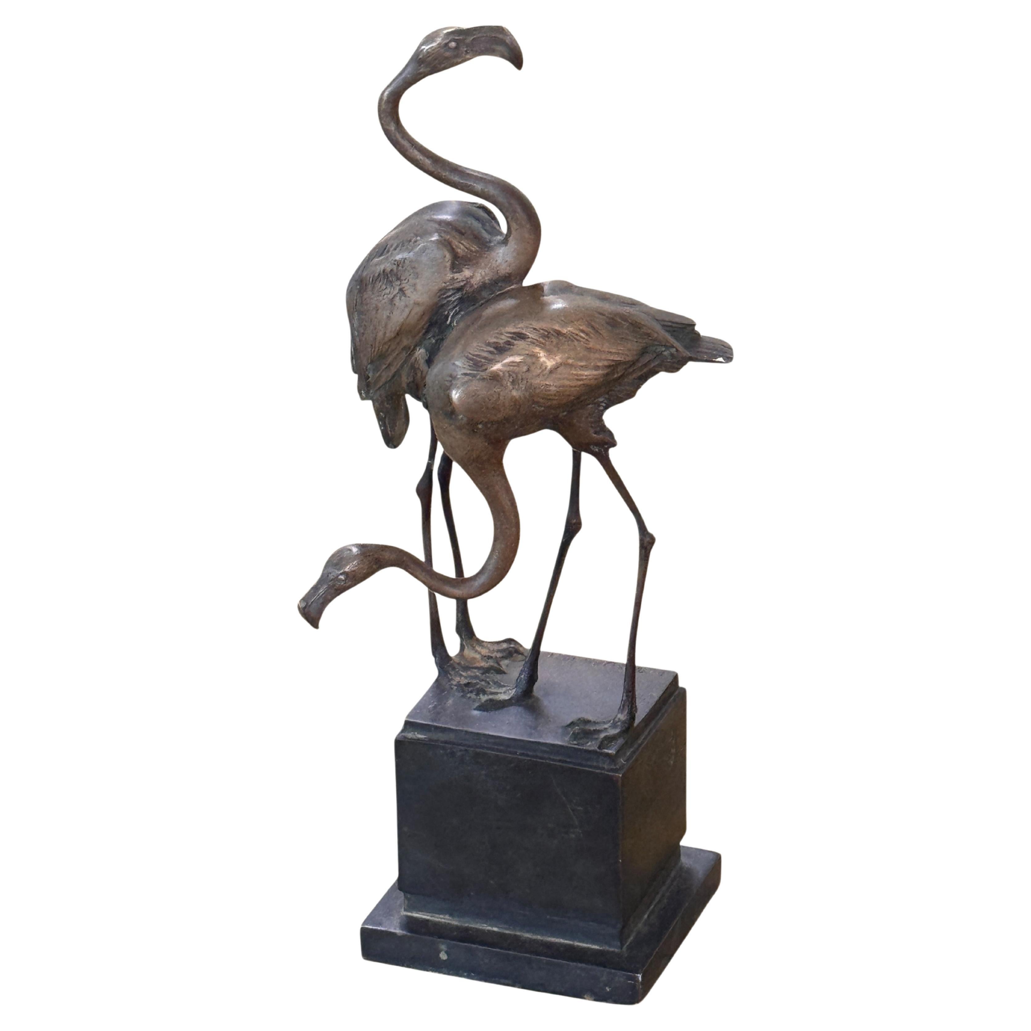 Bronze sculpture of two flamingos standing on a stepped plinth, signed Franz Maz