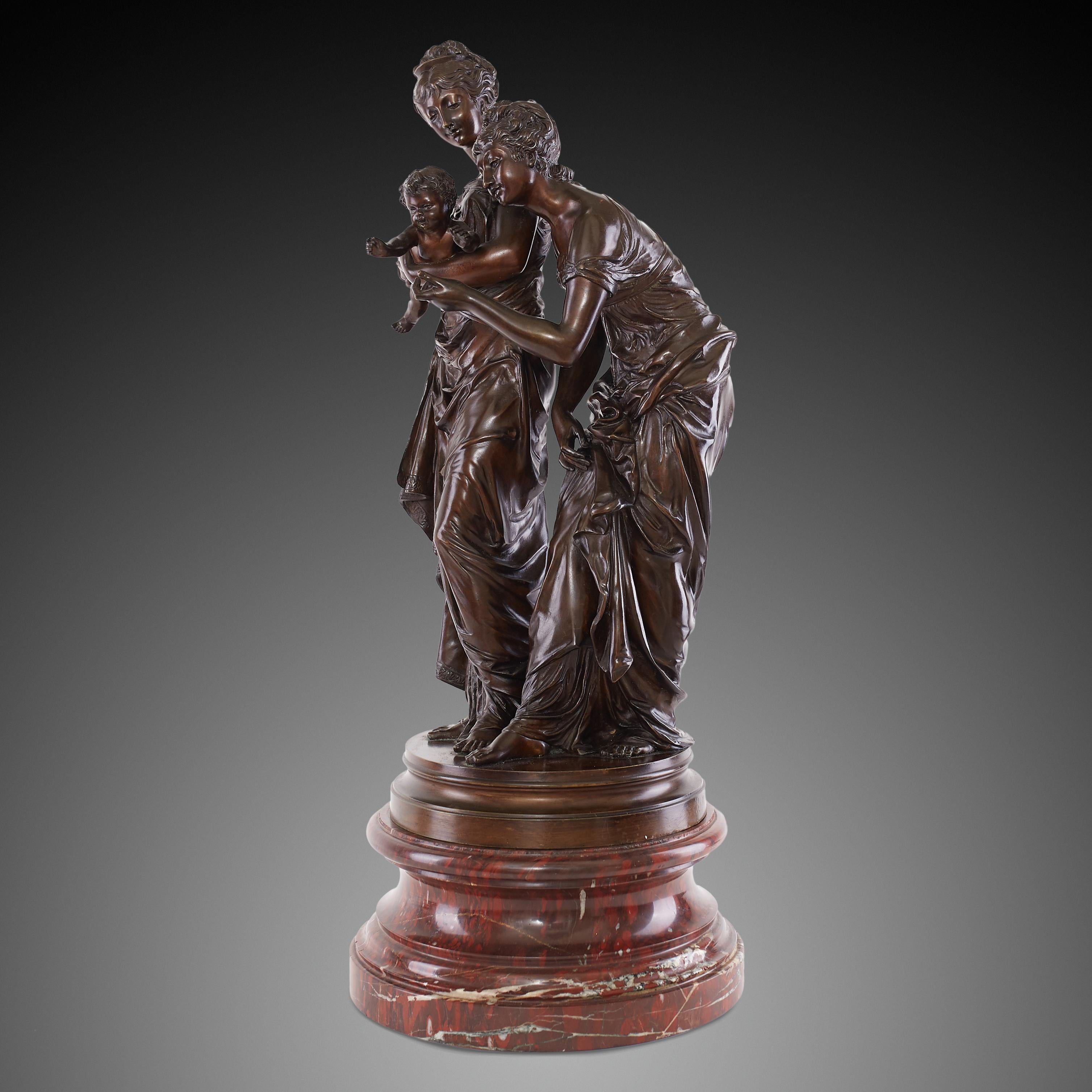 Bronze sculpture of two women with a child from the 19th century with an inscription on the plaque “Salon 1887”. The three characters depicted in this statue give viewers a feeling of love for life. Two women with characteristic Victoria updo with