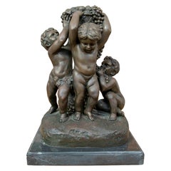 Bronze Sculpture “Putti with a Bunch of Grapes” Signed M. Barbier