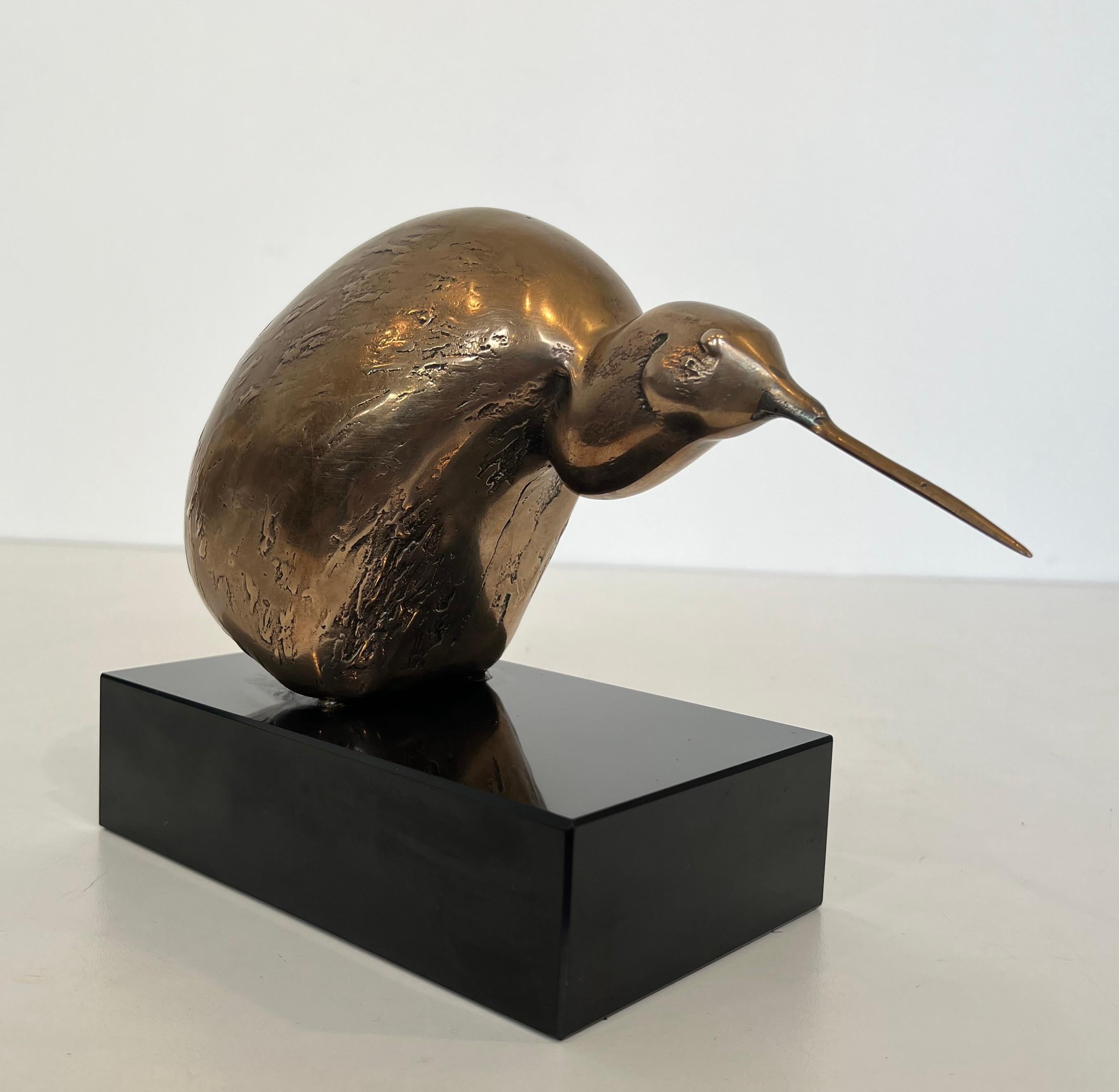 Mid-Century Modern Bronze Sculpture Representing a Stylized Bird on a Black Marble Base, Signed For Sale