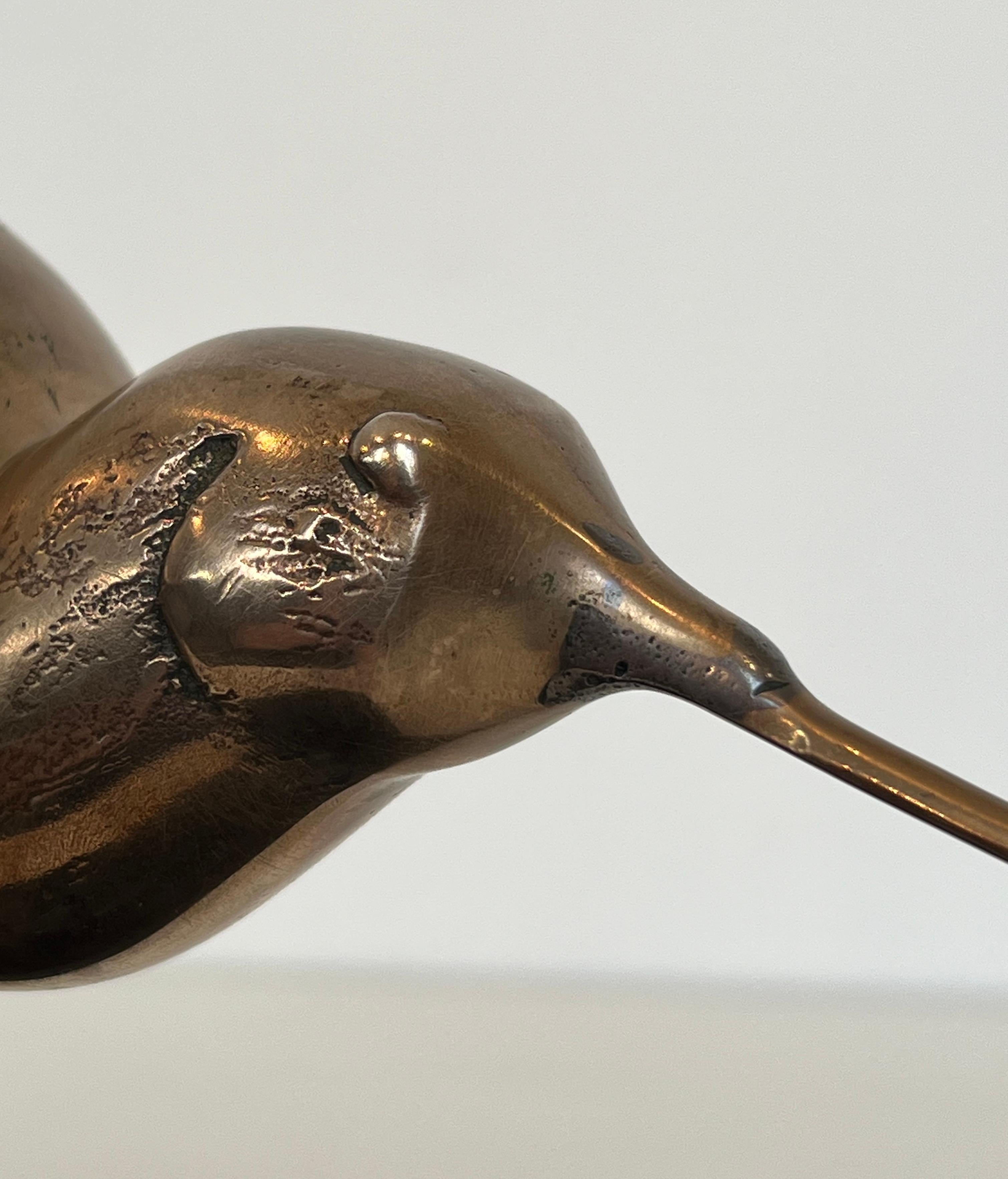 Mid-20th Century Bronze Sculpture Representing a Stylized Bird on a Black Marble Base, Signed For Sale