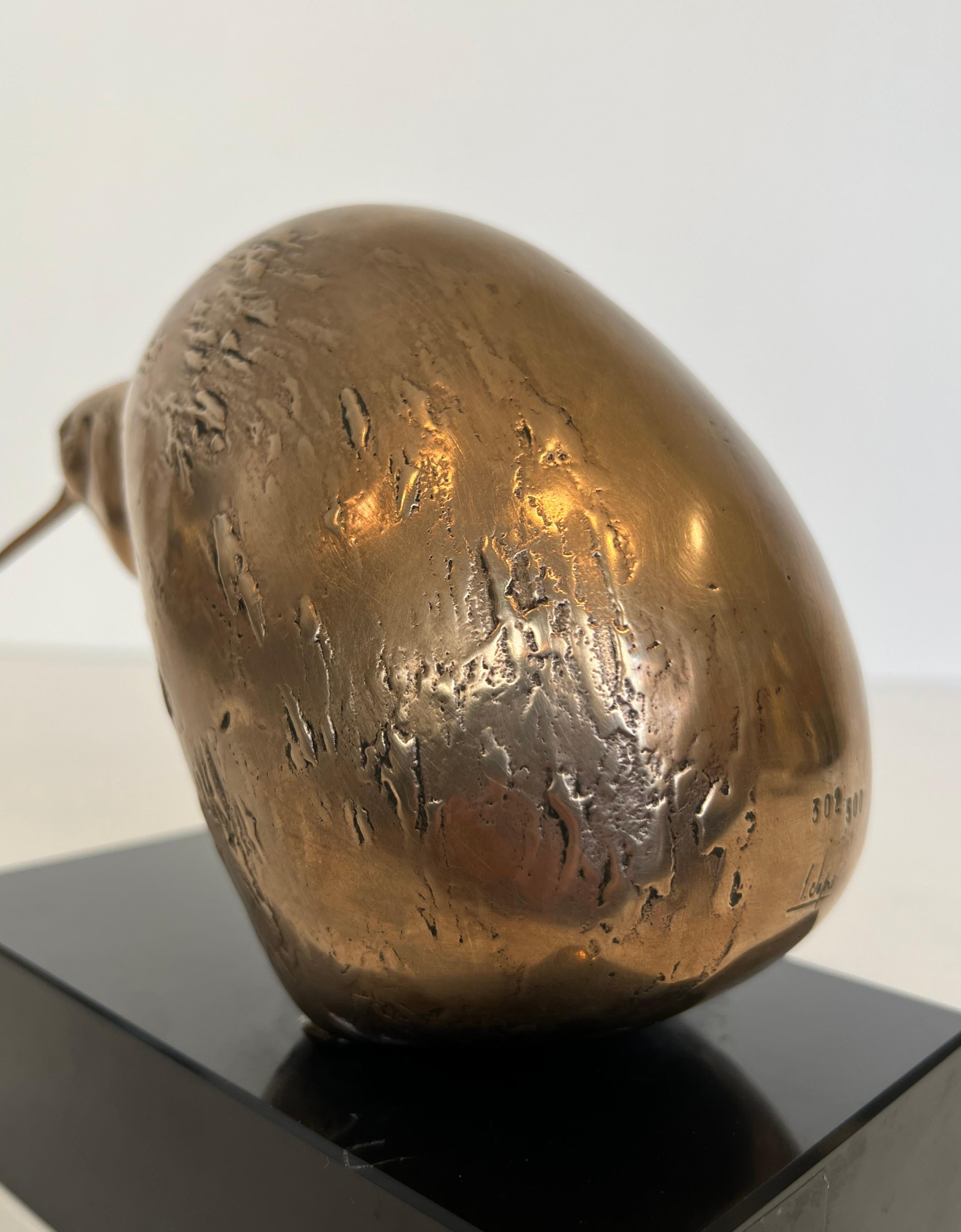 Bronze Sculpture Representing a Stylized Bird on a Black Marble Base, Signed For Sale 1