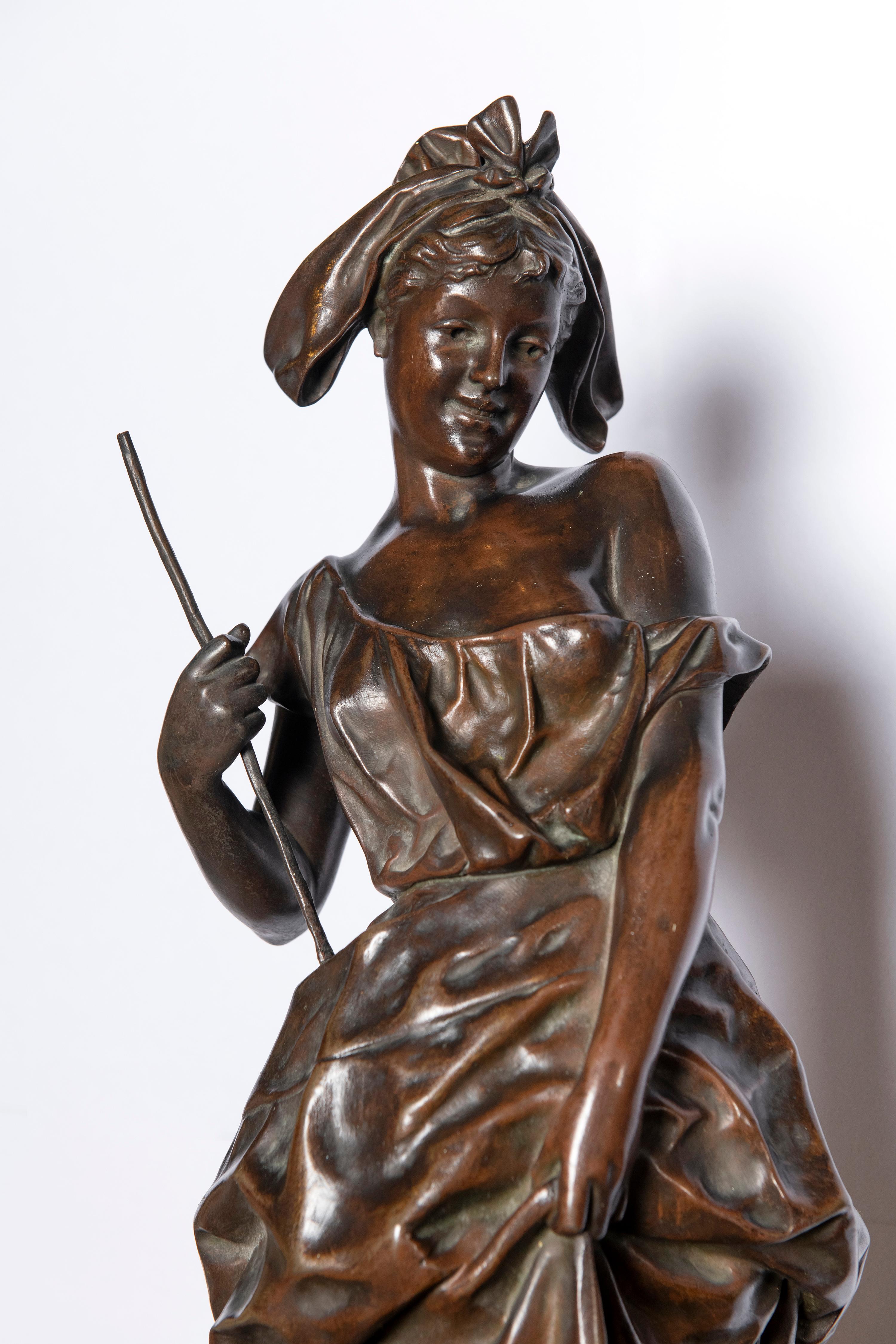 Escultura de bronce firmada G. Obiols, titulada 