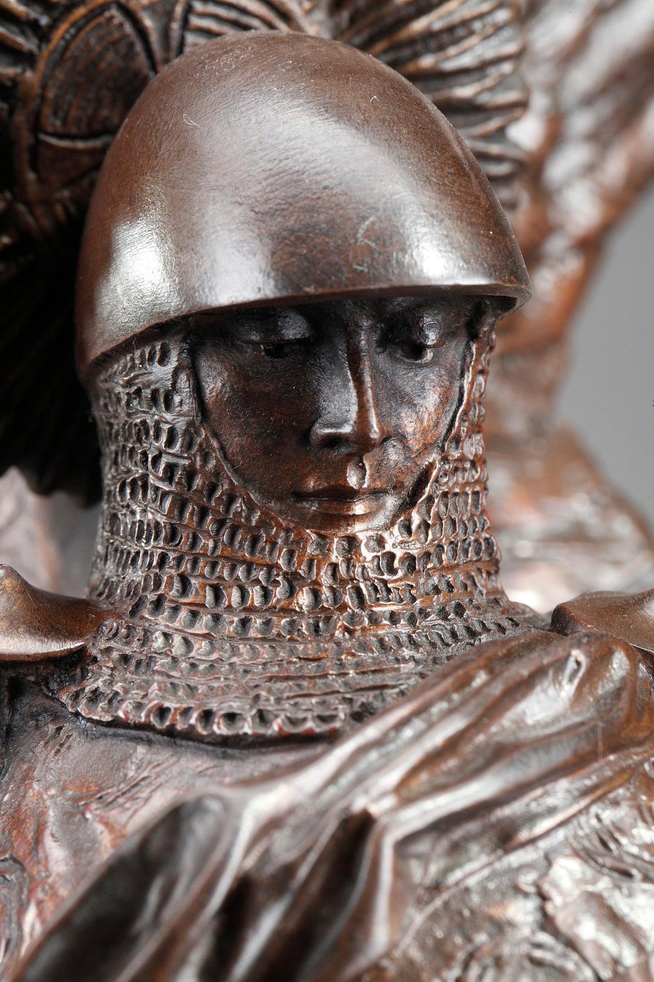 st michael slaying the dragon statue