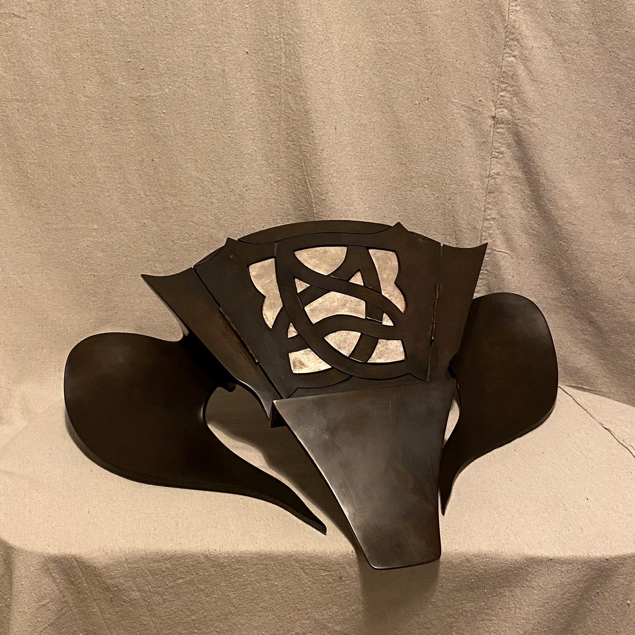 Inspired by the clever fox and the fascinating bat, the cast bronze lectern sculpture is one of three such designs by designer/artist Dana Nicholson. Sculpturally it stands on its own but it also elegantly supports art books or small drawings and