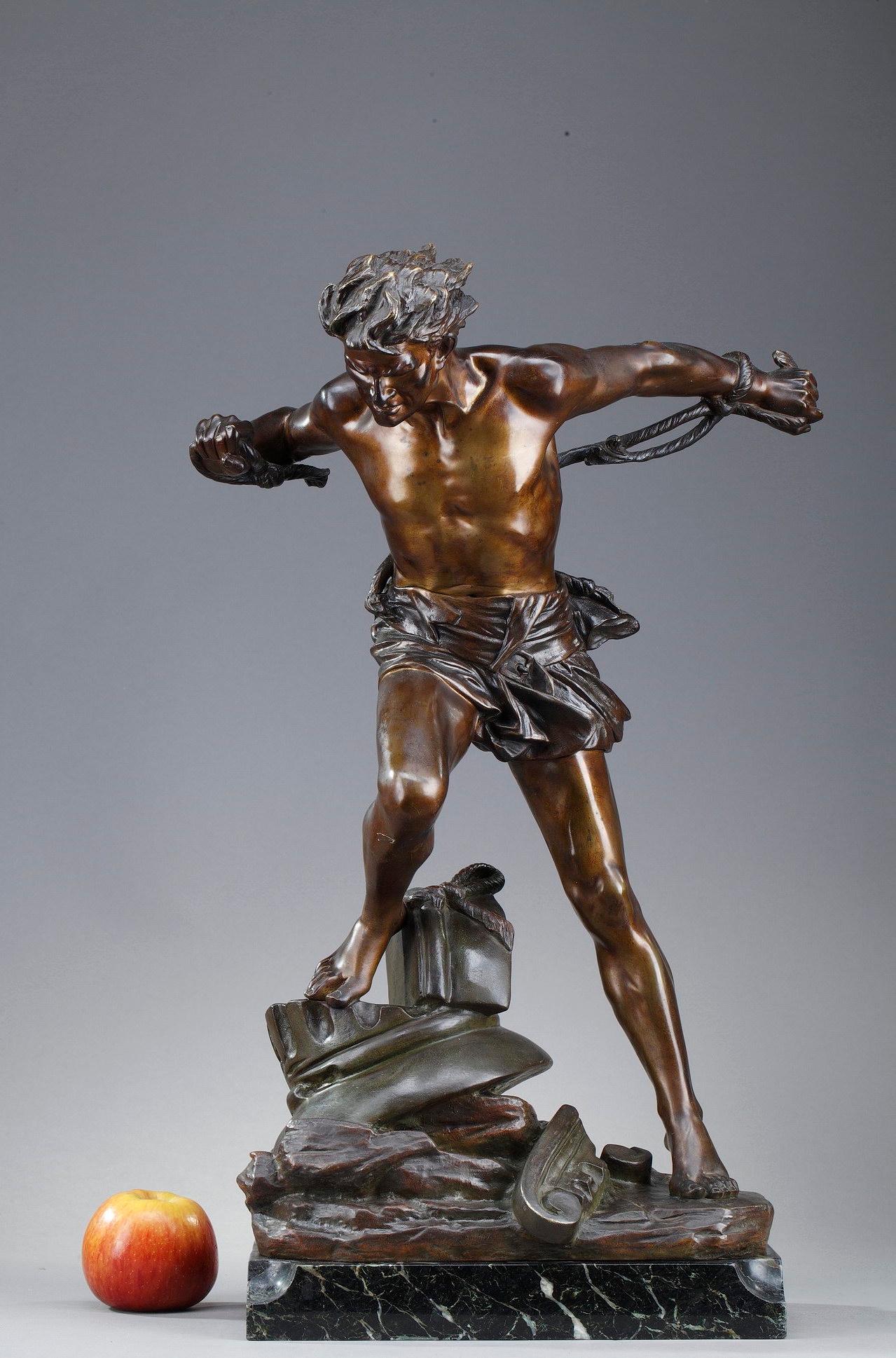 Bronze sculpture with brown patina representing 