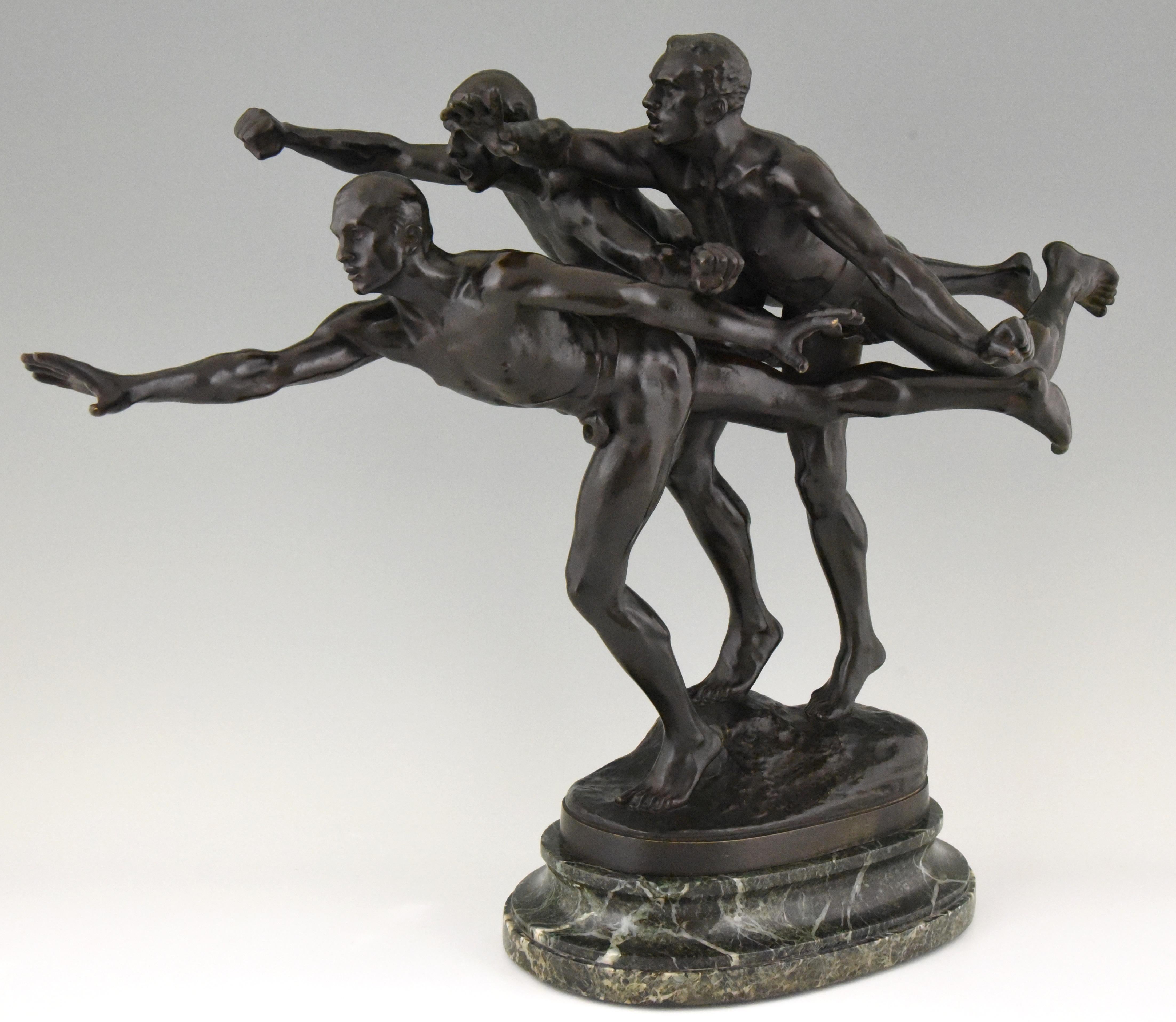 Au but or Les Coureurs, impressive bronze sculpture by the famous French artist Alfred Boucher (1850-1934)
The tree nude runners are just at the goal and intensely struggling, a most difficult theme executed with the greatest skill.
This bronze is