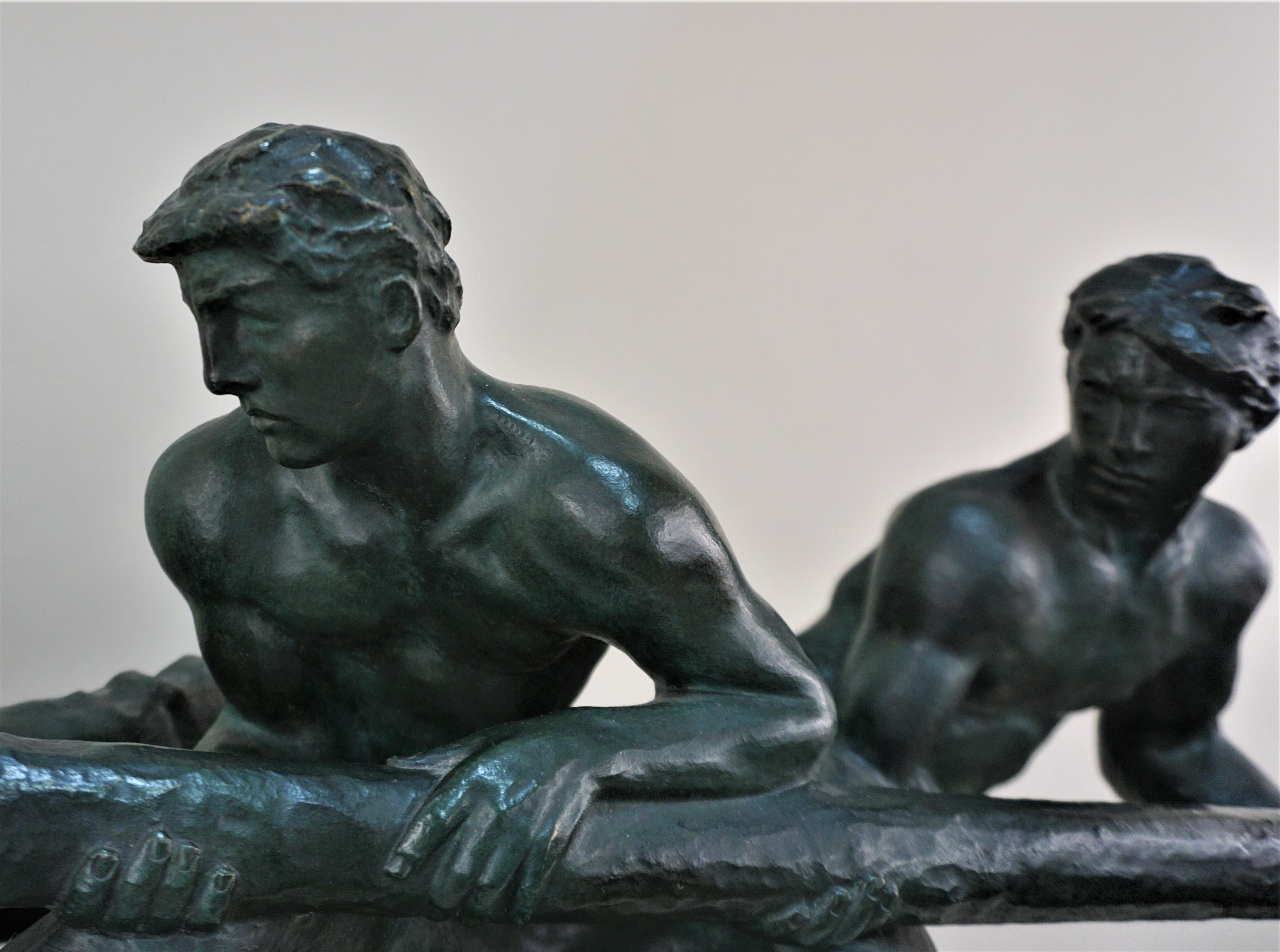 A bronze sculpture two men steering signed by Hungarian - French sculptor Alexandre Kelety.
Foundry mark 