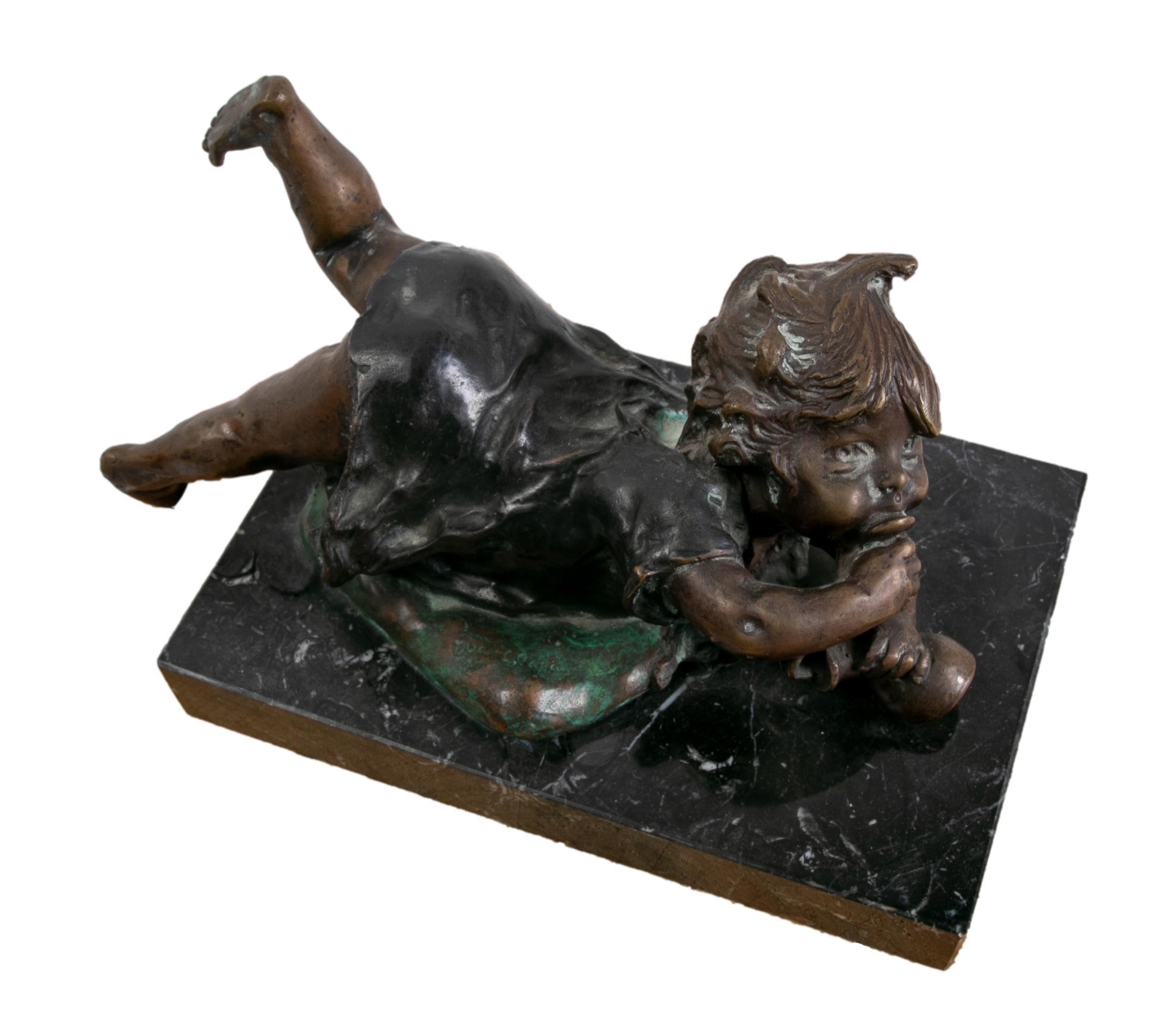 Bronze Sculpture with Marble Base of a Little Girl Lying Down. In Good Condition For Sale In Marbella, ES