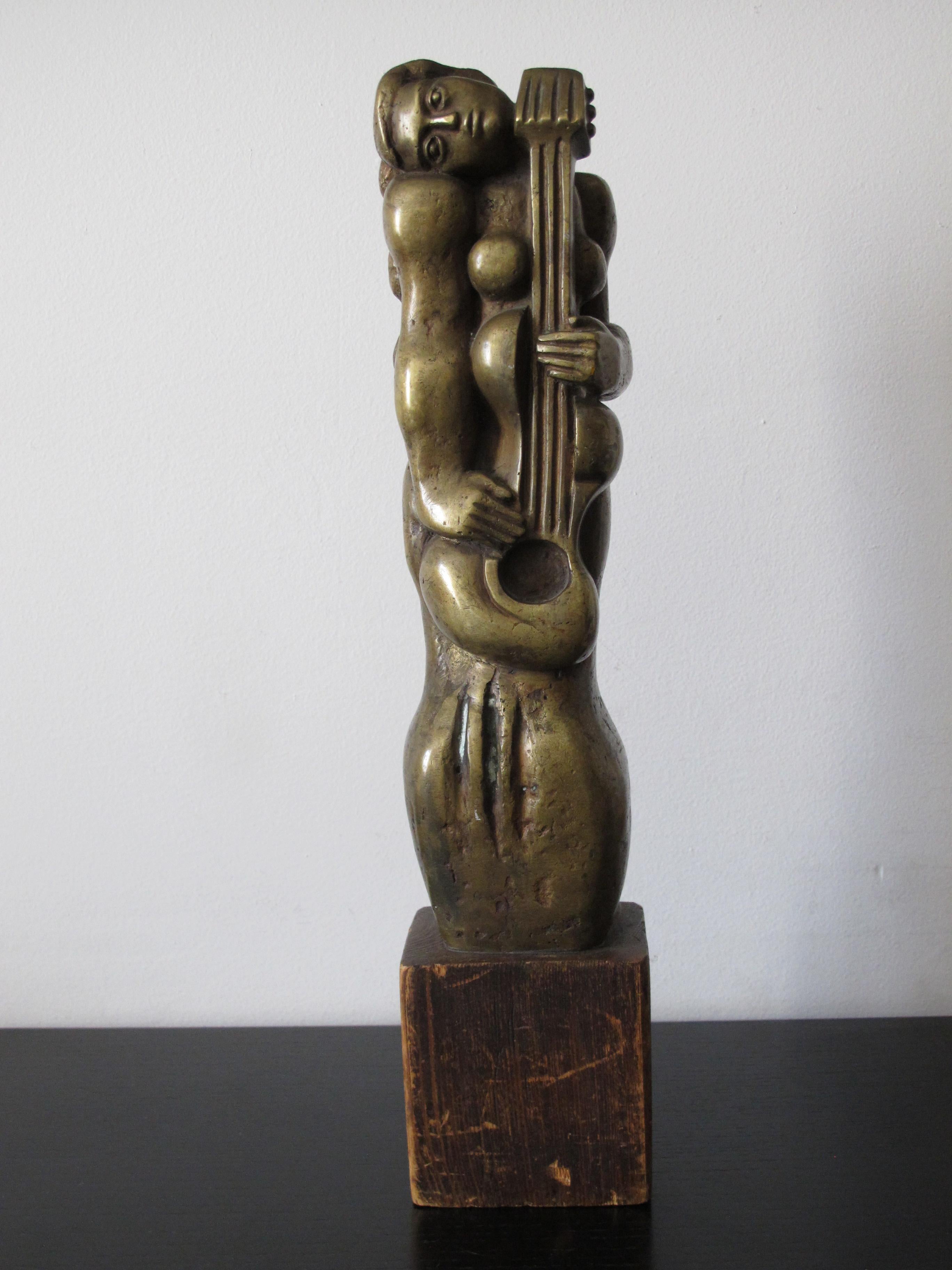 Anonymous.
Woman with guitar.

Gilded bronze sculpture.


