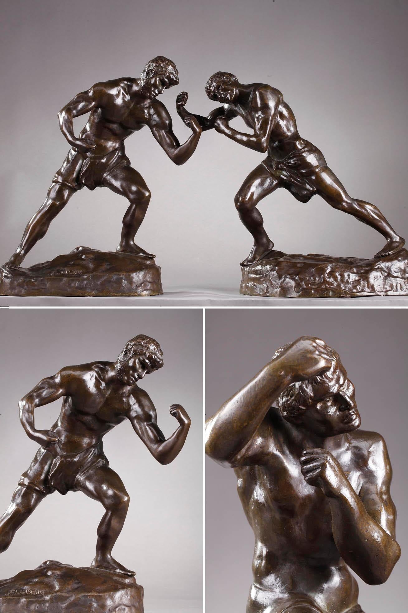 Pair of bronze statuettes with brown patina representing two boxers in full combat, made by Jef Lambeaux (1852-1908). The artist admirably captures the moment and the dynamism, as well as the concentration of the athletes. These statuettes are