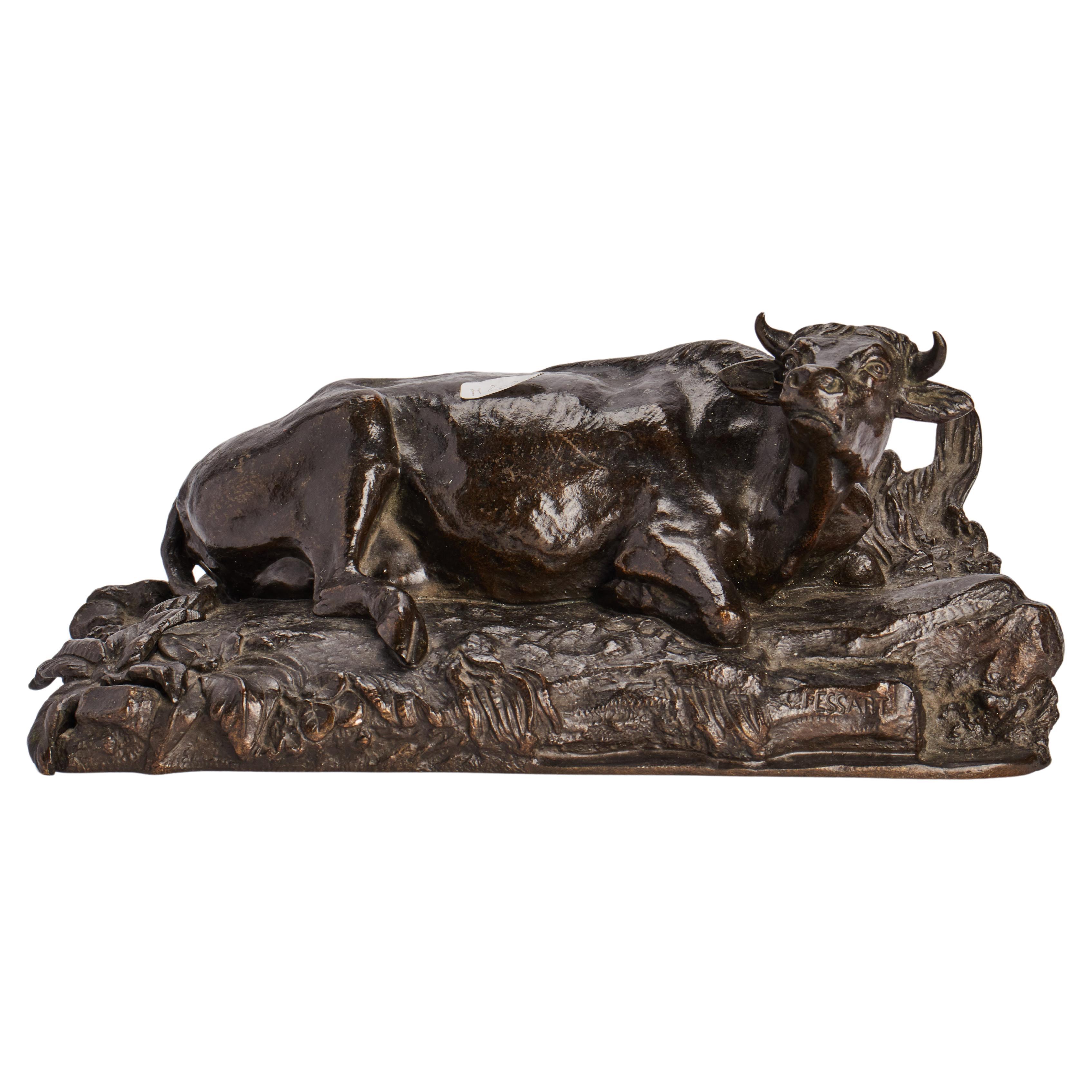 Bronze sculture depicting a layning cow signed Fessart, France 1870. For Sale