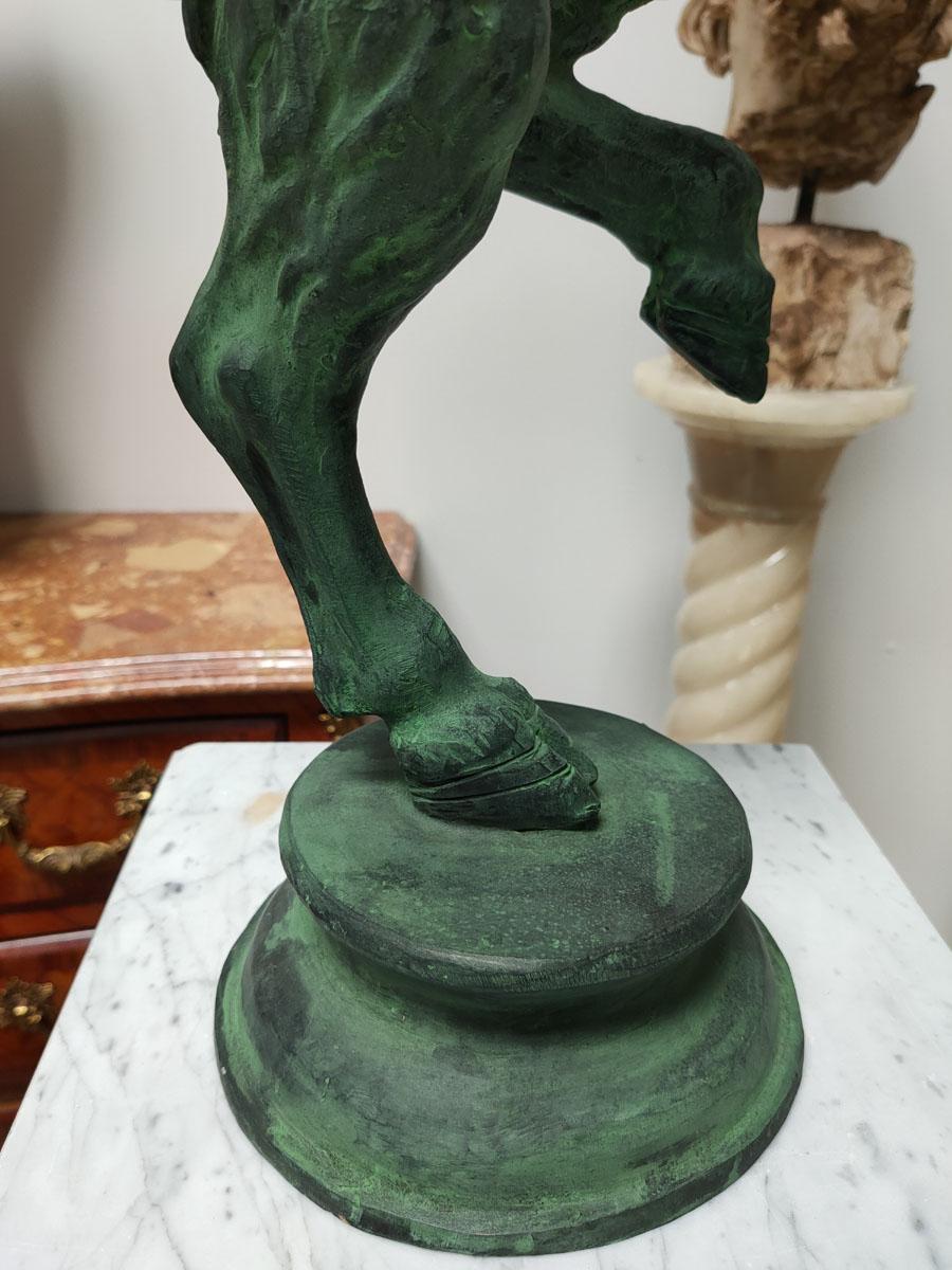 Patinated Bronze Sculpture of Young Pan Playing the Aulos For Sale