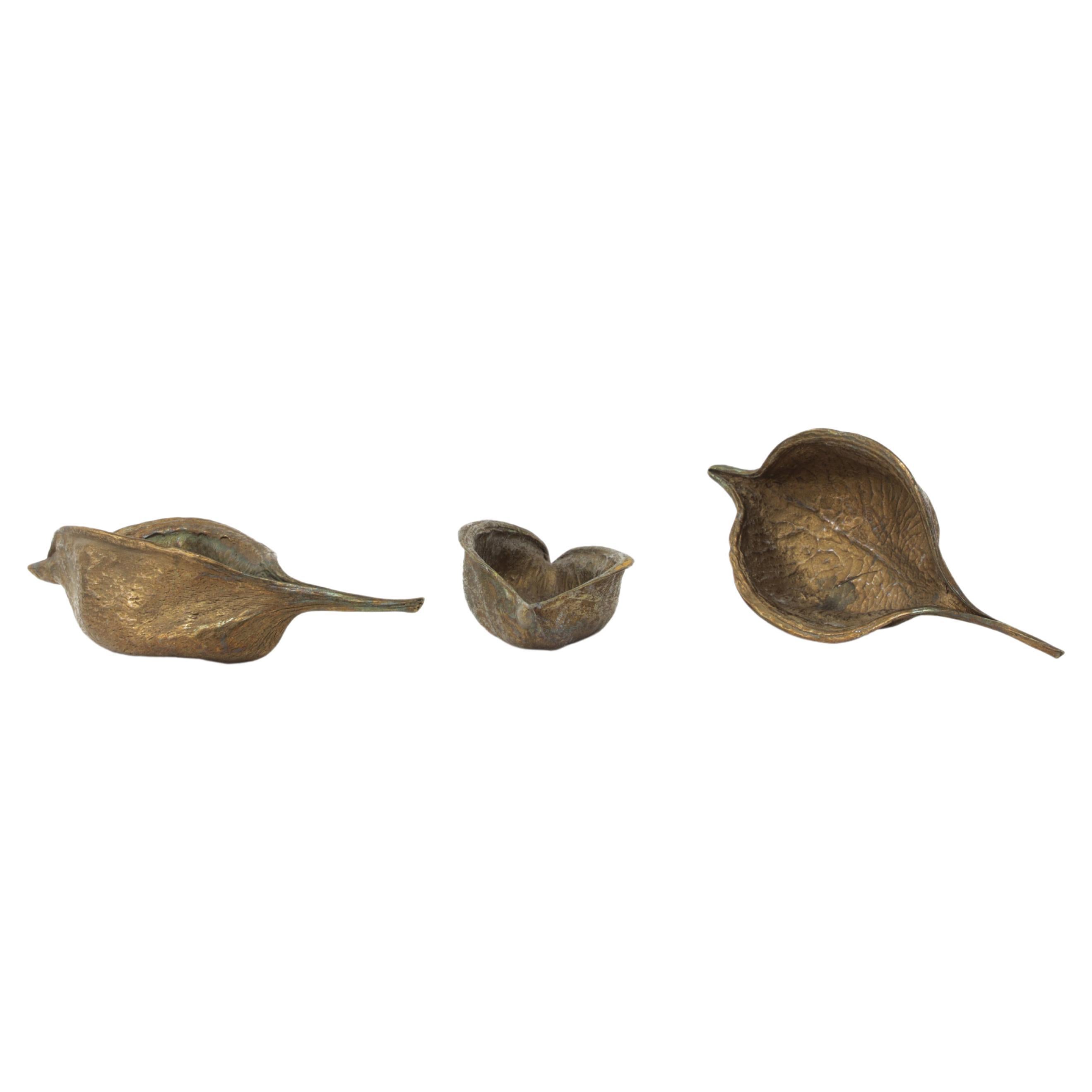 Set of 3 cast bronze seed pods. The can be used for salt and spices at the dining table or for jewelry and small things. Use your imagination!
Made in Los Angeles.