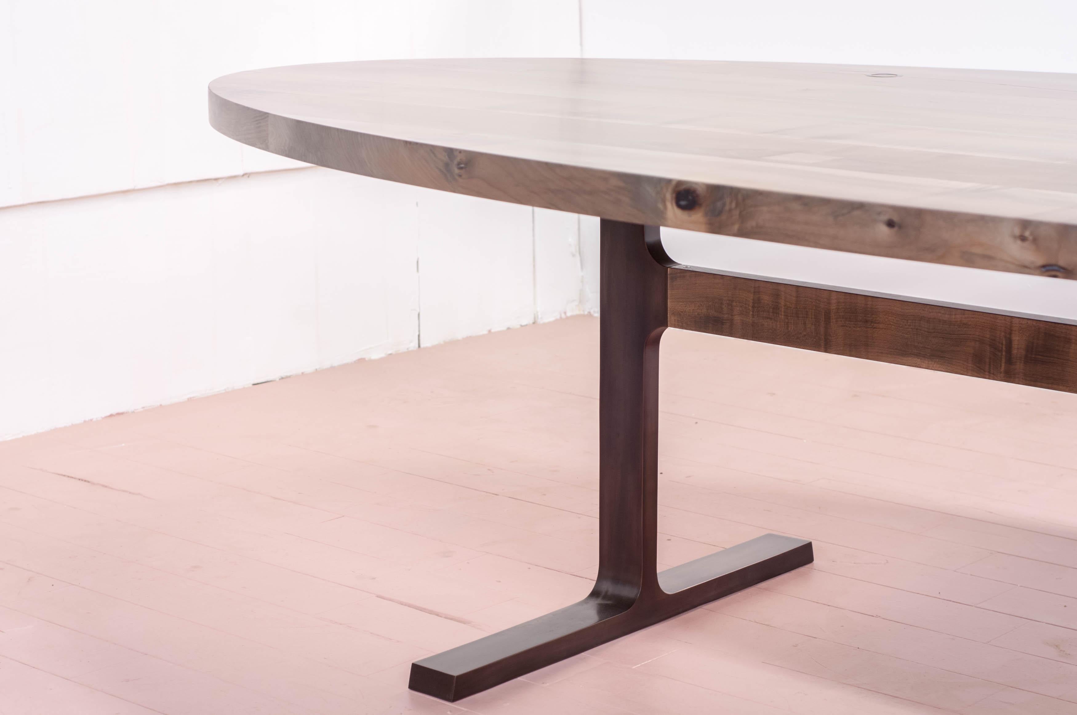 The shaker table is the first award winning design from the studio at Jeff Martin Joinery. It examines the interface between cast bronze and solid wood using bronze casting for joinery functionality. 

Distilled to its purest elements, the bronze