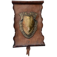 Bronze Shield on Rustic Leather Scroll Wall Hanging