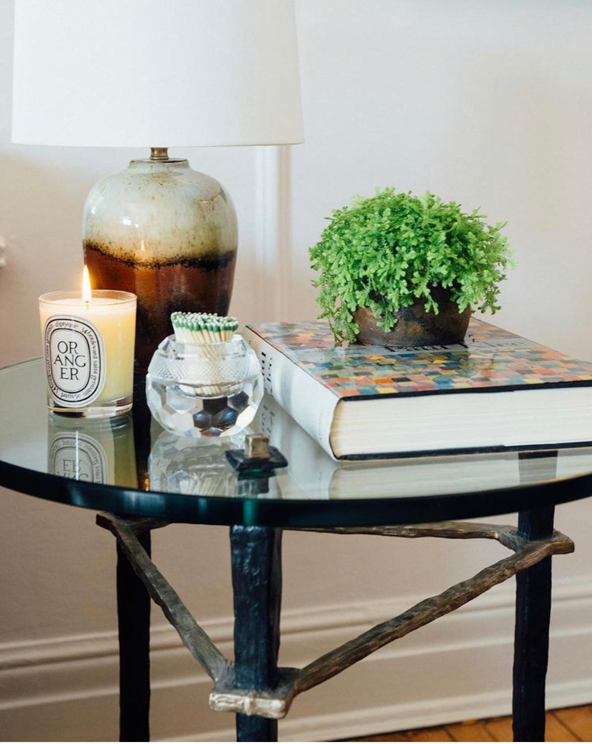 bronze end table with glass top