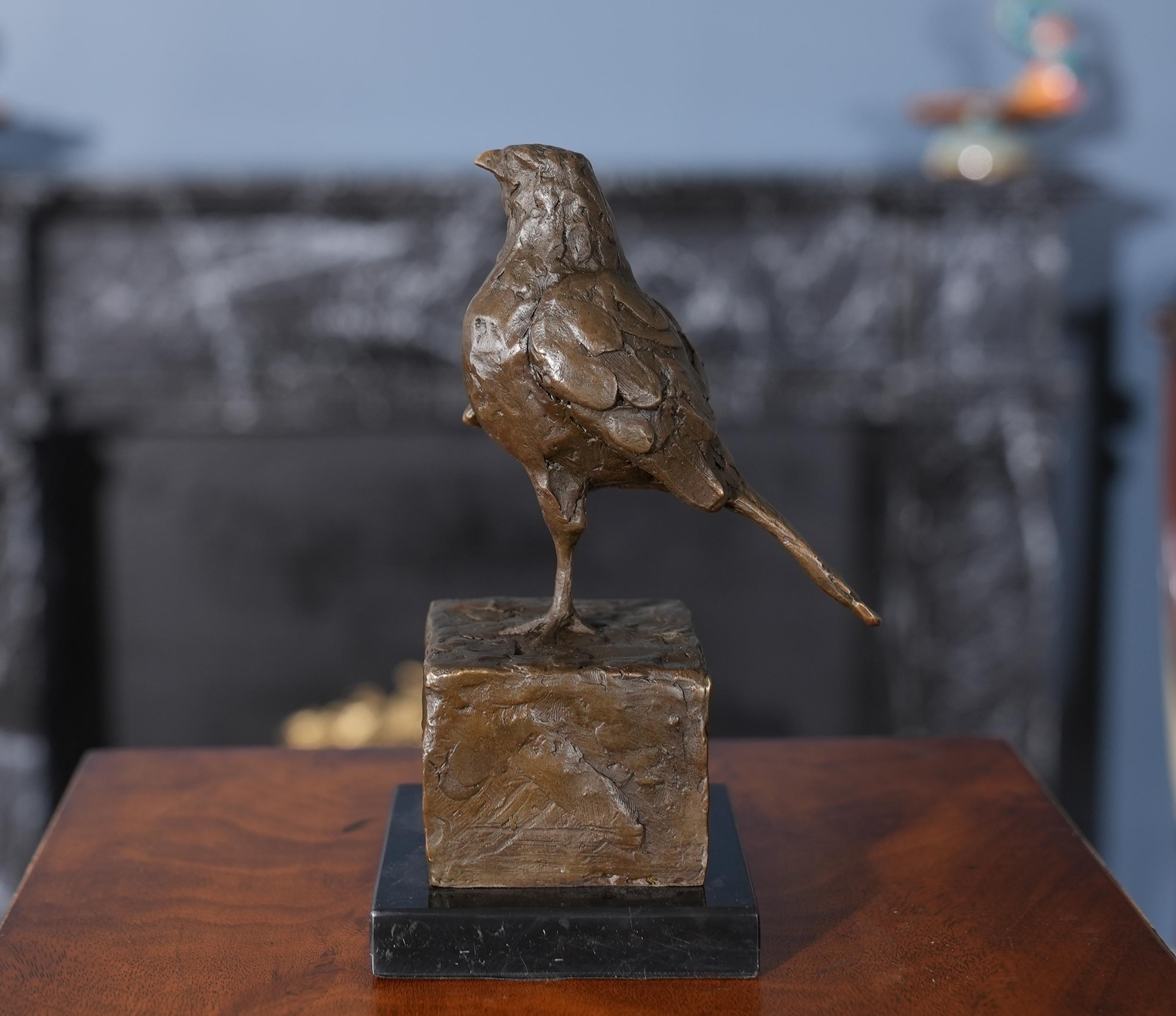 Graceful even when standing still the Bronze Sparrow on Marble Base is a striking addition to any setting. Using traditional lost wax casting methods the Bronze sparrow statue has hand chaised details added to give it a high level of detail to the