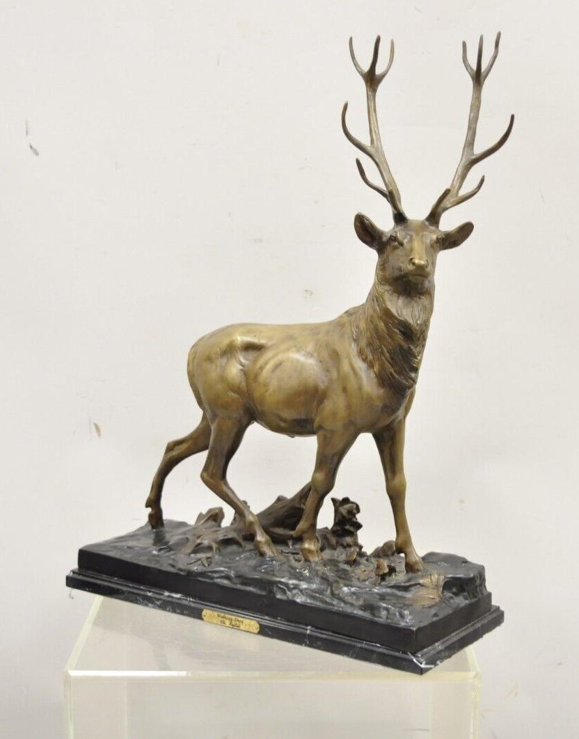 Bronze stag walking deer statue on marble base after Charles Paillet. Item features brass plate to marble base which reads 