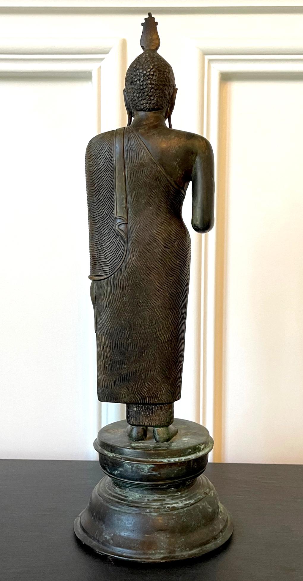 bronze standing buddha statue origin