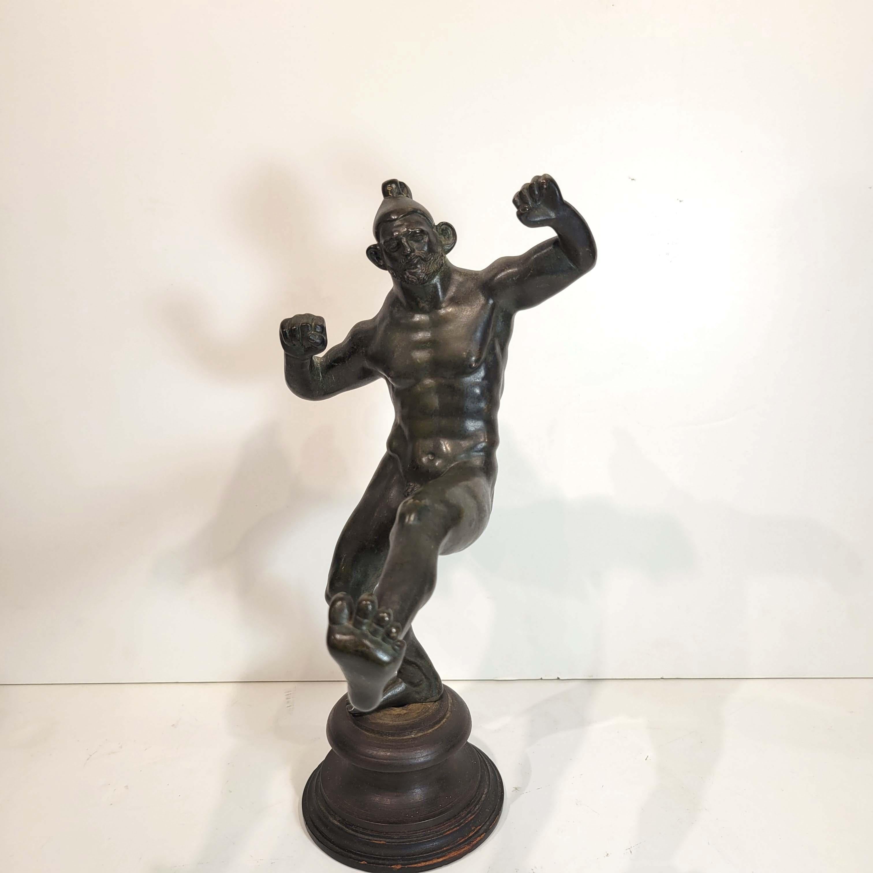 The original bronze statuette depicting a fighter, artefact from Autun, France. Roman Civilisation, 1st century. Paris, Musée Du Louvre.
This is a copy which was probably made in late 18th or early 19th century in Italy .
The bronze is solid cast