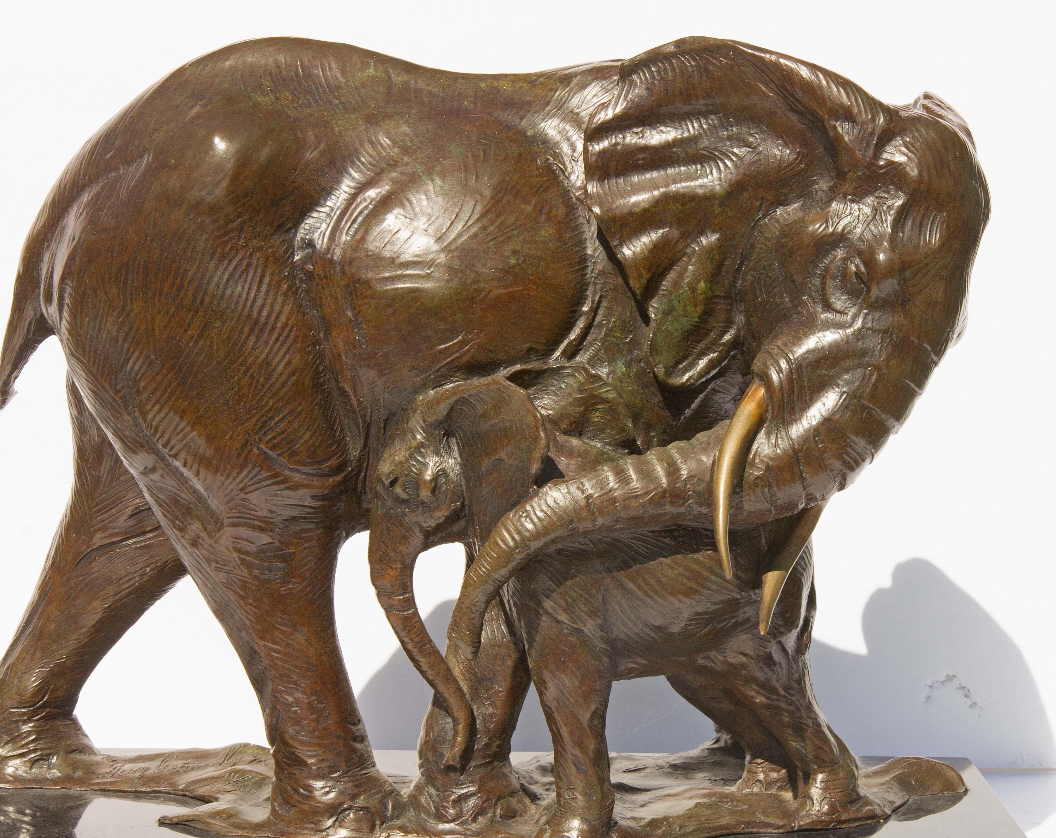 Poignant bronze sculpture of nurturing mother elephant and her calf. Rich brown patina with hints of verdigris. By American sculptor Dan Ostermiller. Signed and dated 1992. Casting number 14 out of 30. Mounted on marble and wood base. 
One of