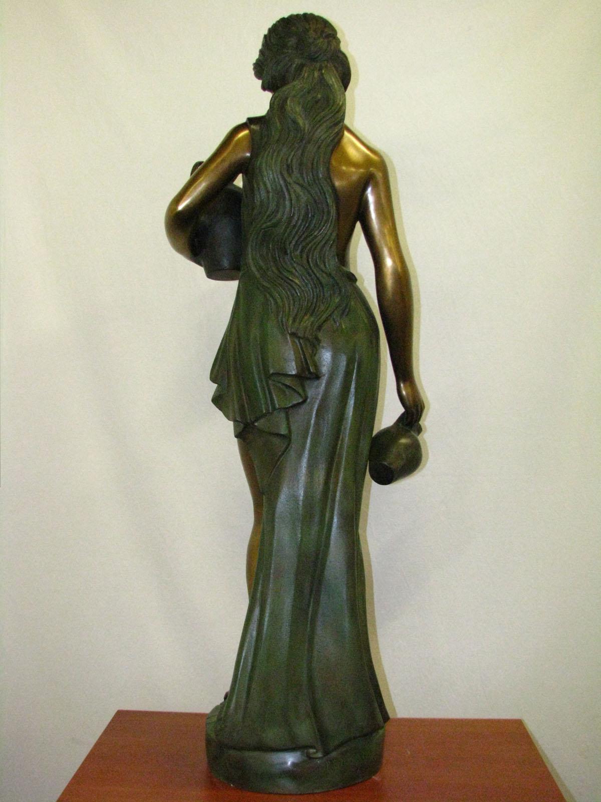 bronze girl statue