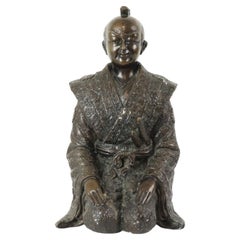 Estatua de bronce Guerrero japonés arrodillado Samurai Siglo XX