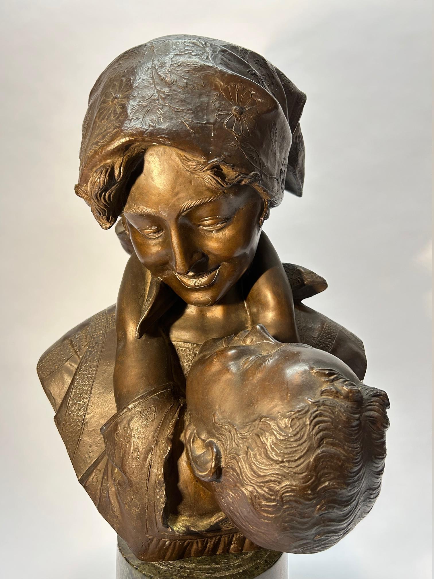 Beautiful signed, Auguste Moreau, statue of mother and child.

He is credited as one of the most important representatives of Art Nouveau, with ornate realistic and highly detailed sculptures. His work was first exhibited at the Paris Salon (