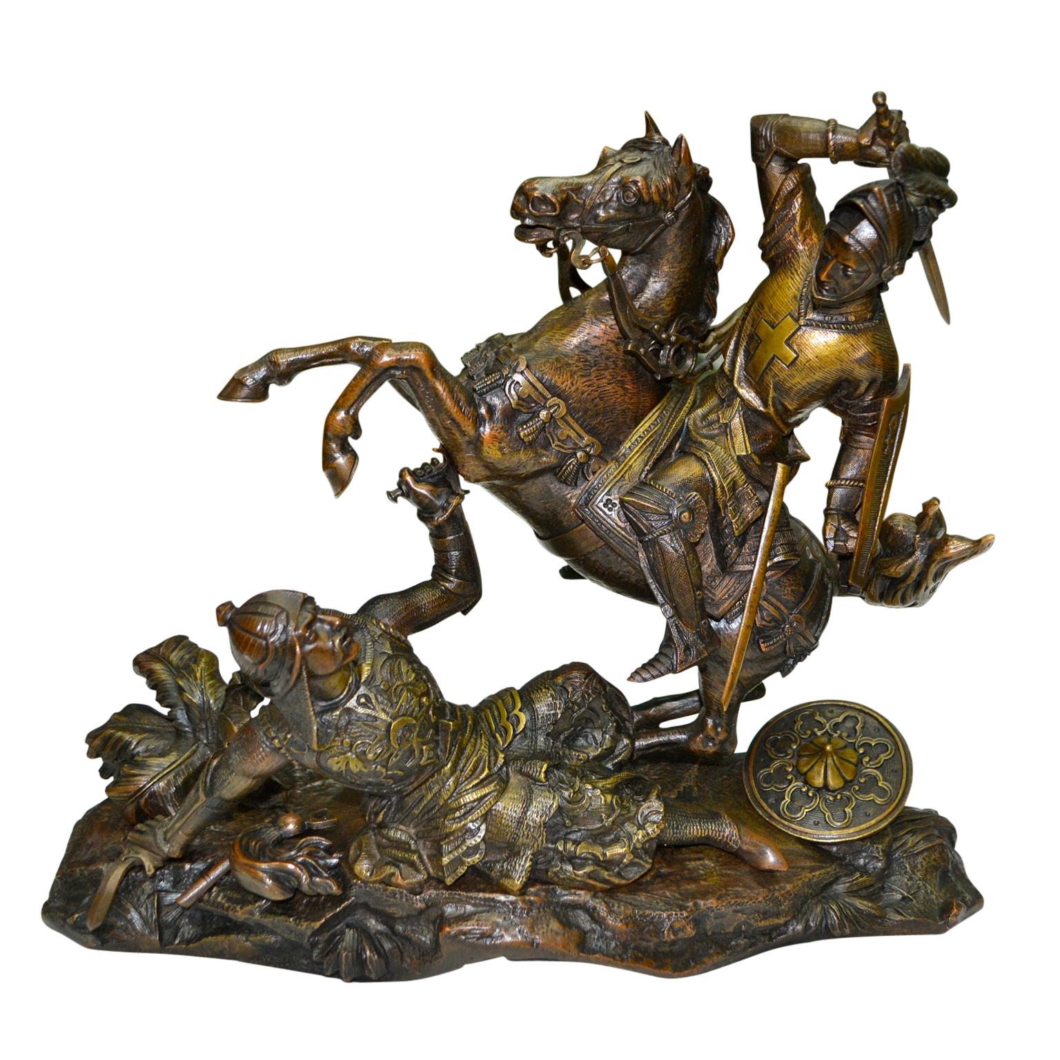 A rare and  a highly charged late 19 century unsigned sculpture in finely chiselled bronze of  the medieval Frankish  king Charles Martel  in full armour on his rearing battle horse with one hand aloft wielding a swordready to strike the mortal  to