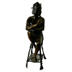 Bronze Statue of a Girl on a Stool Drinking Champaign