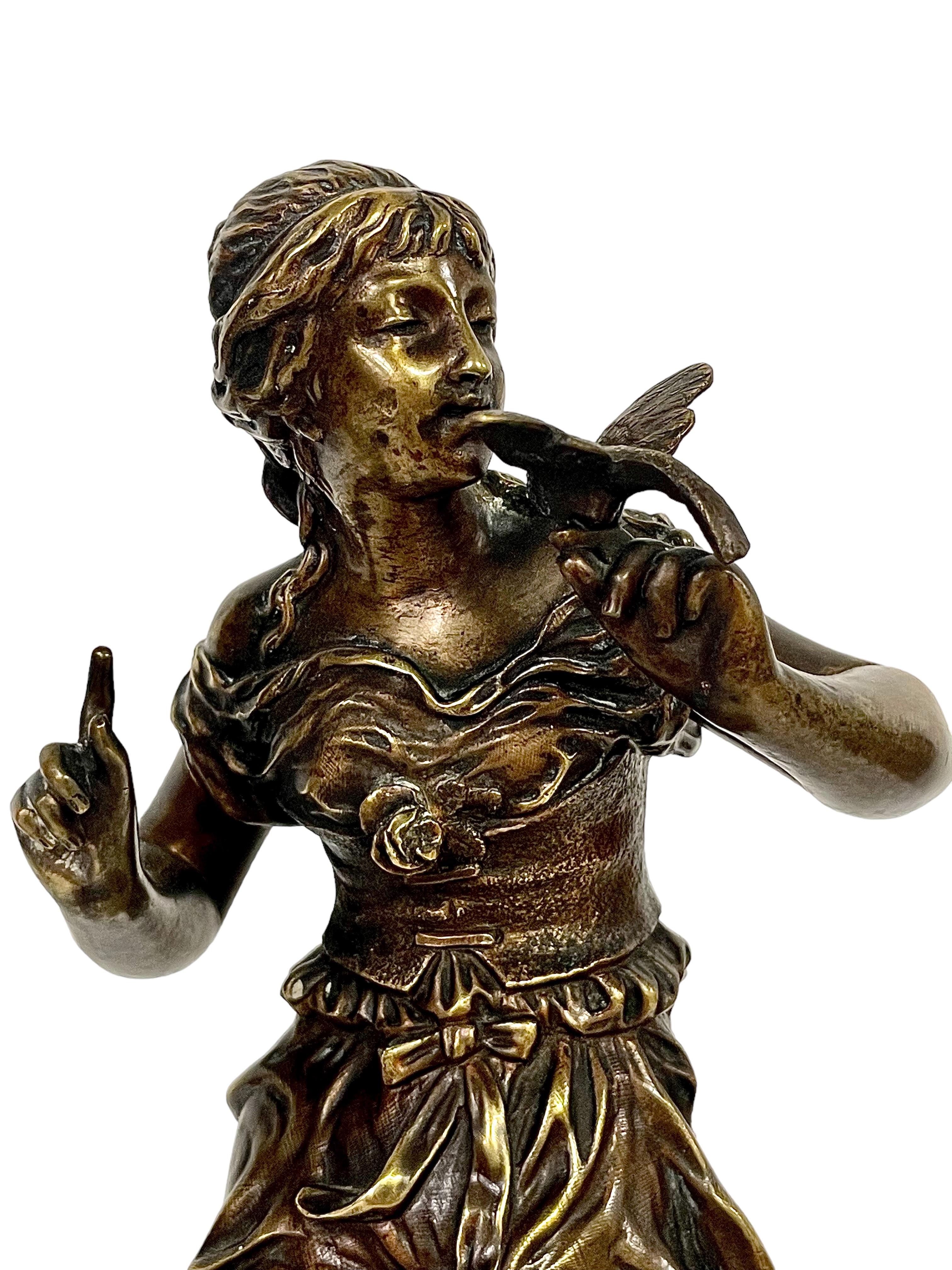 Gilt 19th C. French Bronze Statue of a Young Woman with a Bird, by A.E. Gaudez For Sale