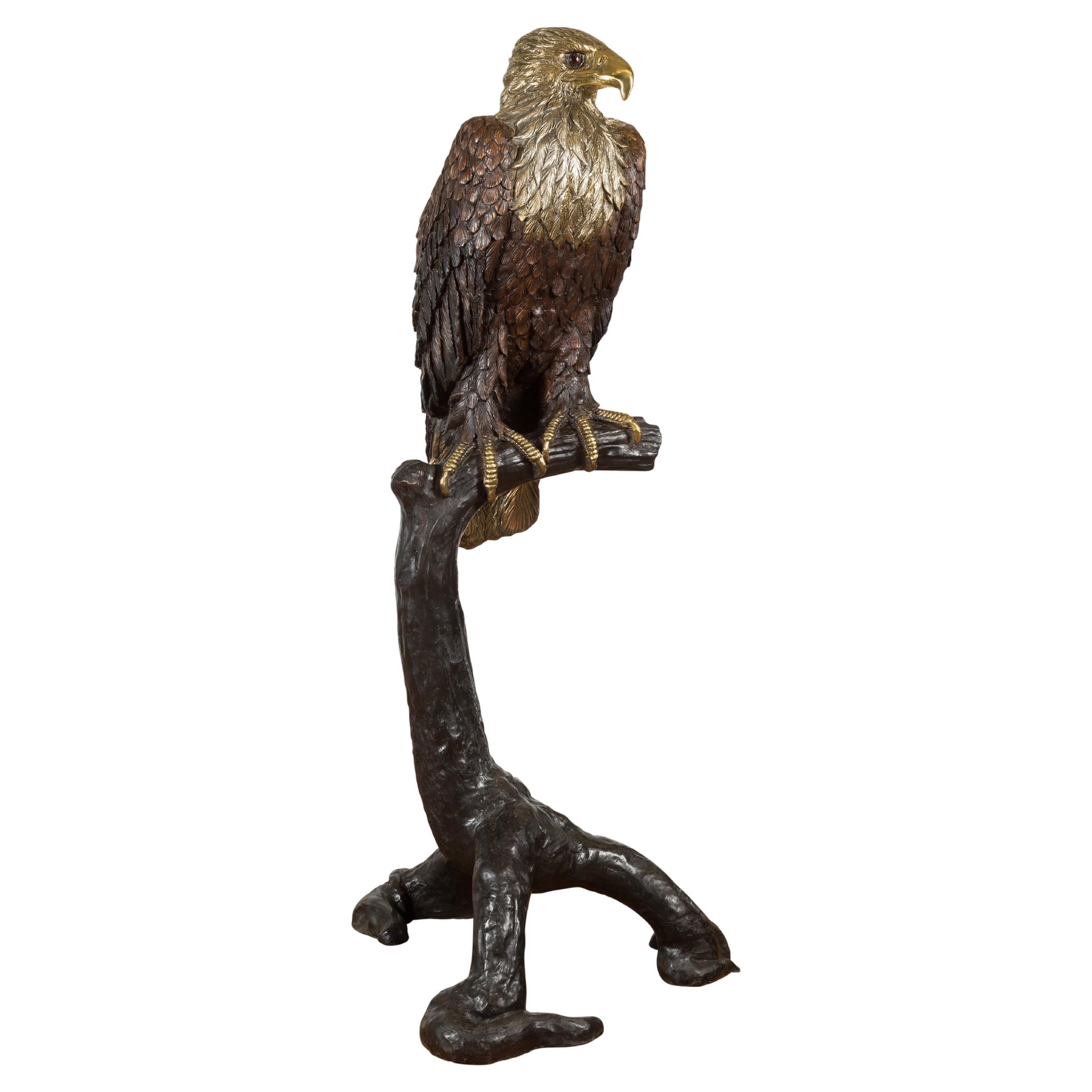 Bronze Statue of an Eagle Perched on a Branch with Gold and Silver Highlights For Sale